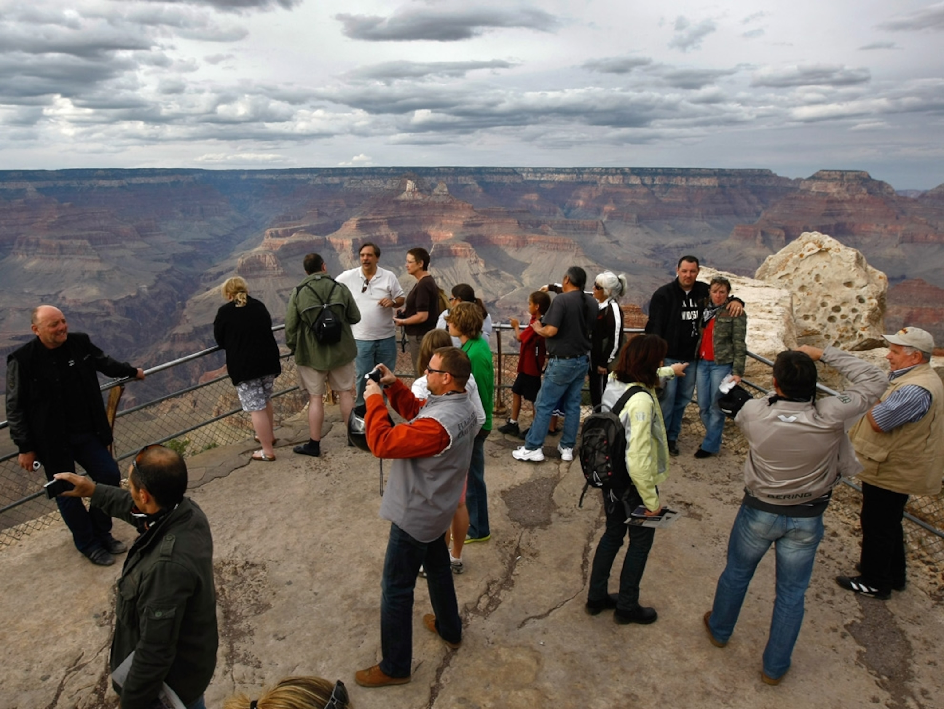 Tourists taking photos at the Grand Canyon