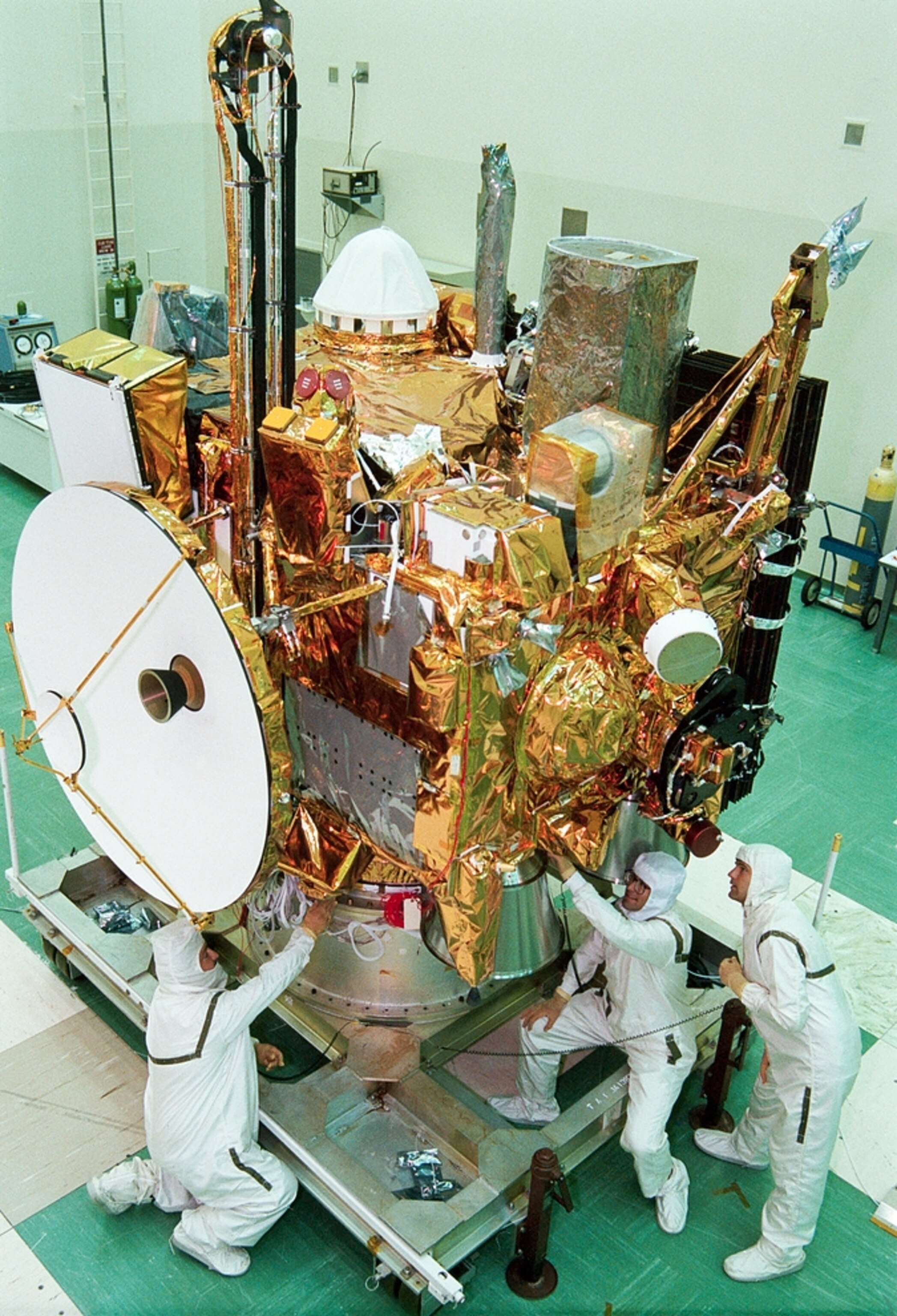 Mars curse picture: workers tinkering with the Mars Observer spacecraft
