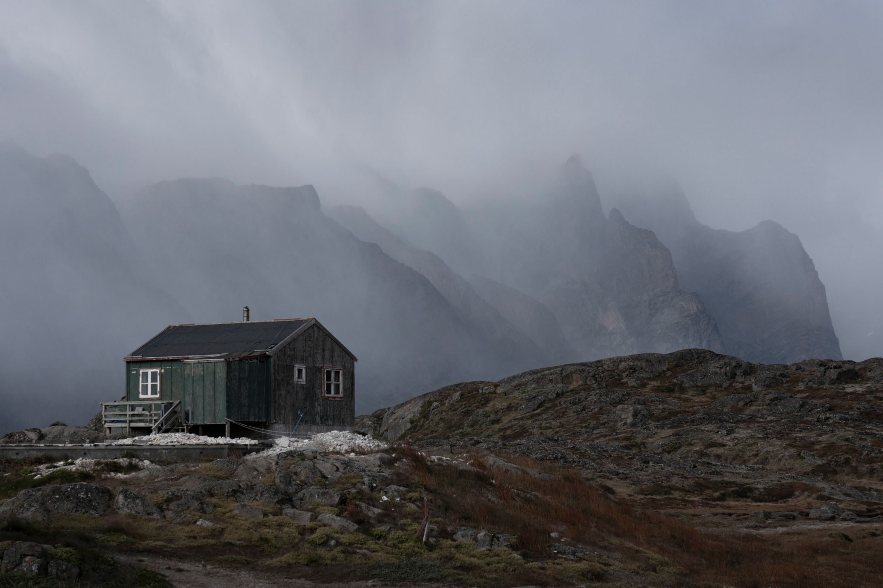 home in inclement weather in Narsaq Kajulleq, Greenland