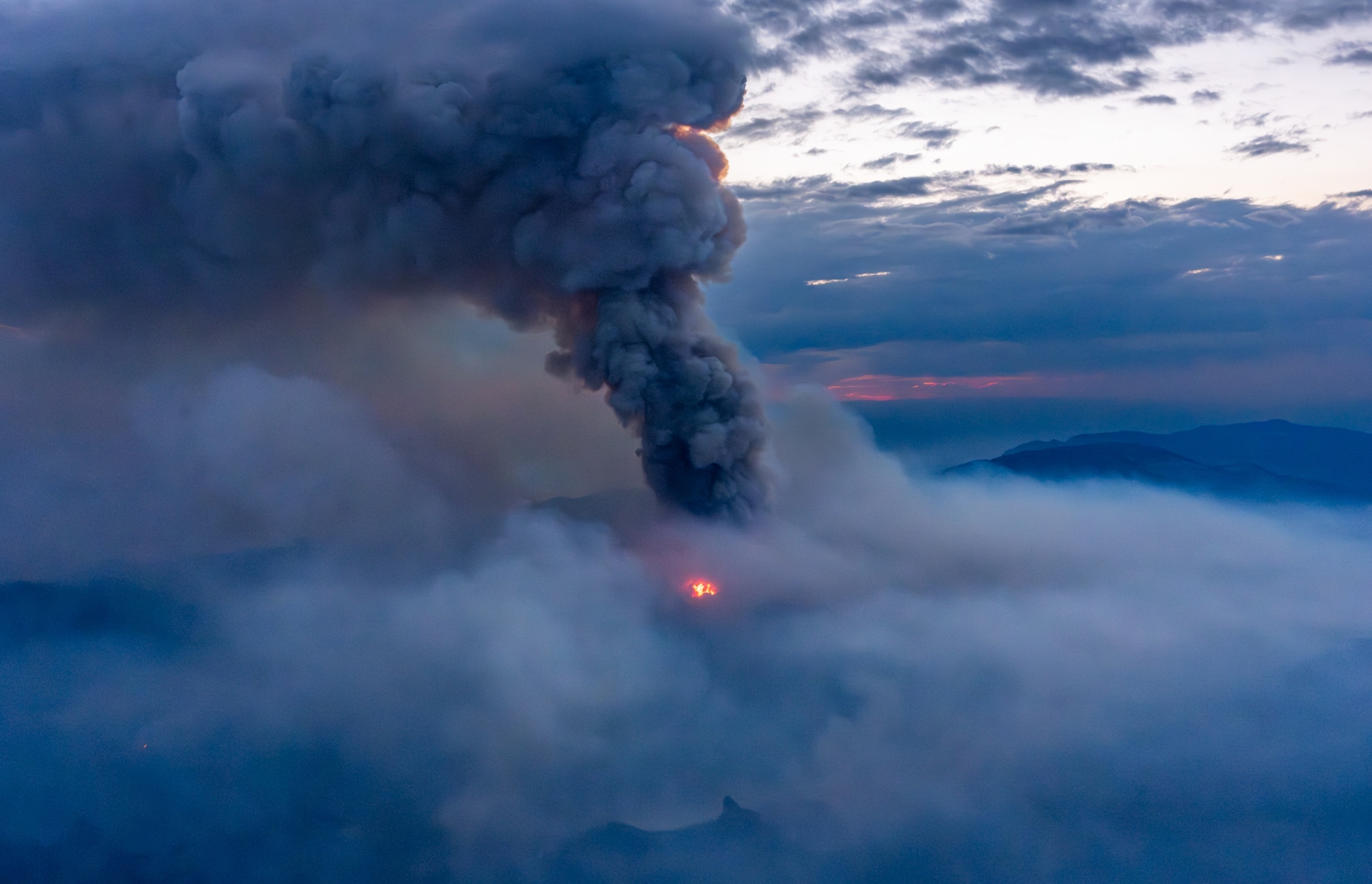 Smoke plume billows from the Gold Mountain Fire near Ouray Colorado.