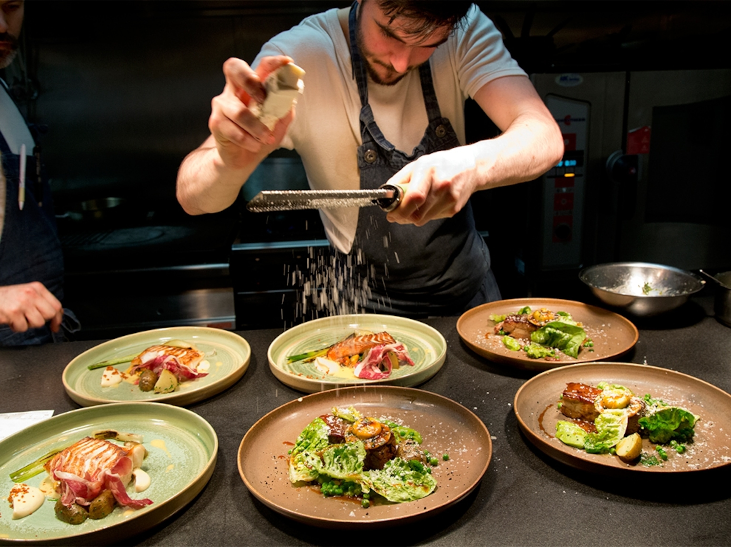 a chef preparing dishes at Forest Avenue in Dublin, Ireland
