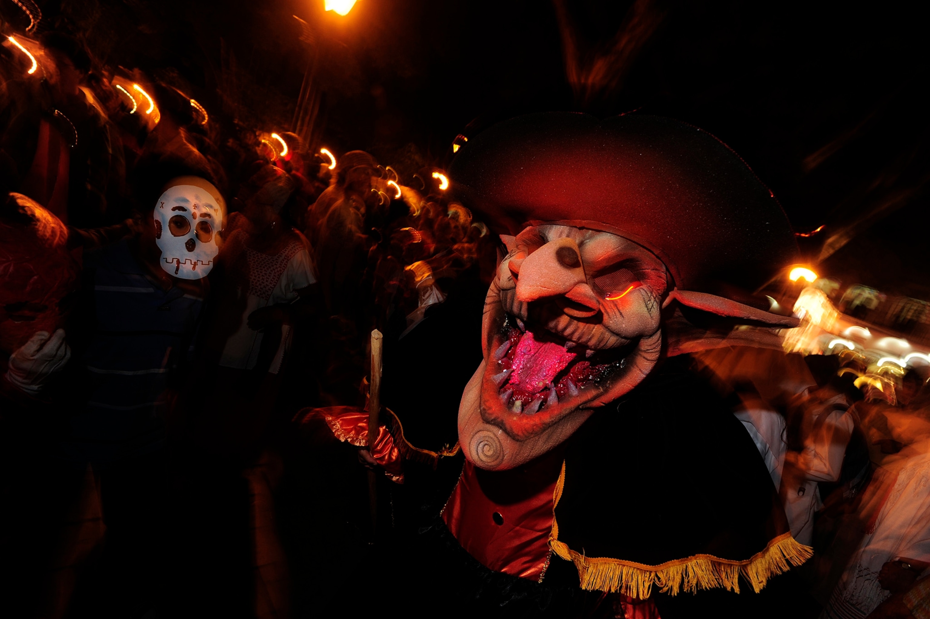 People dressed up for the 'comparsa' or Day of the Dead Procession in Oaxaca, Oaxaca State, Mexico in 2009.
