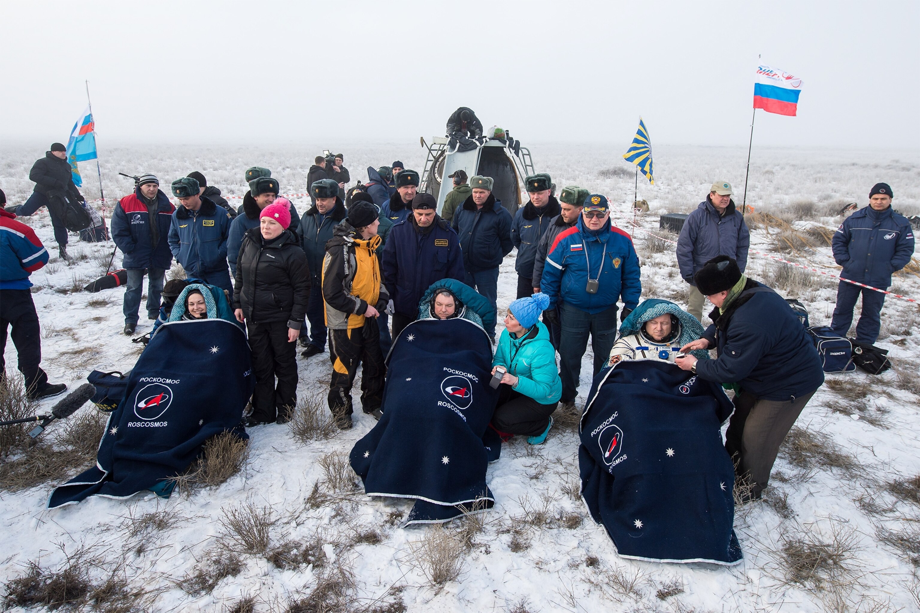 astronauts after landing the Soyuz TMA-14M spacecraft