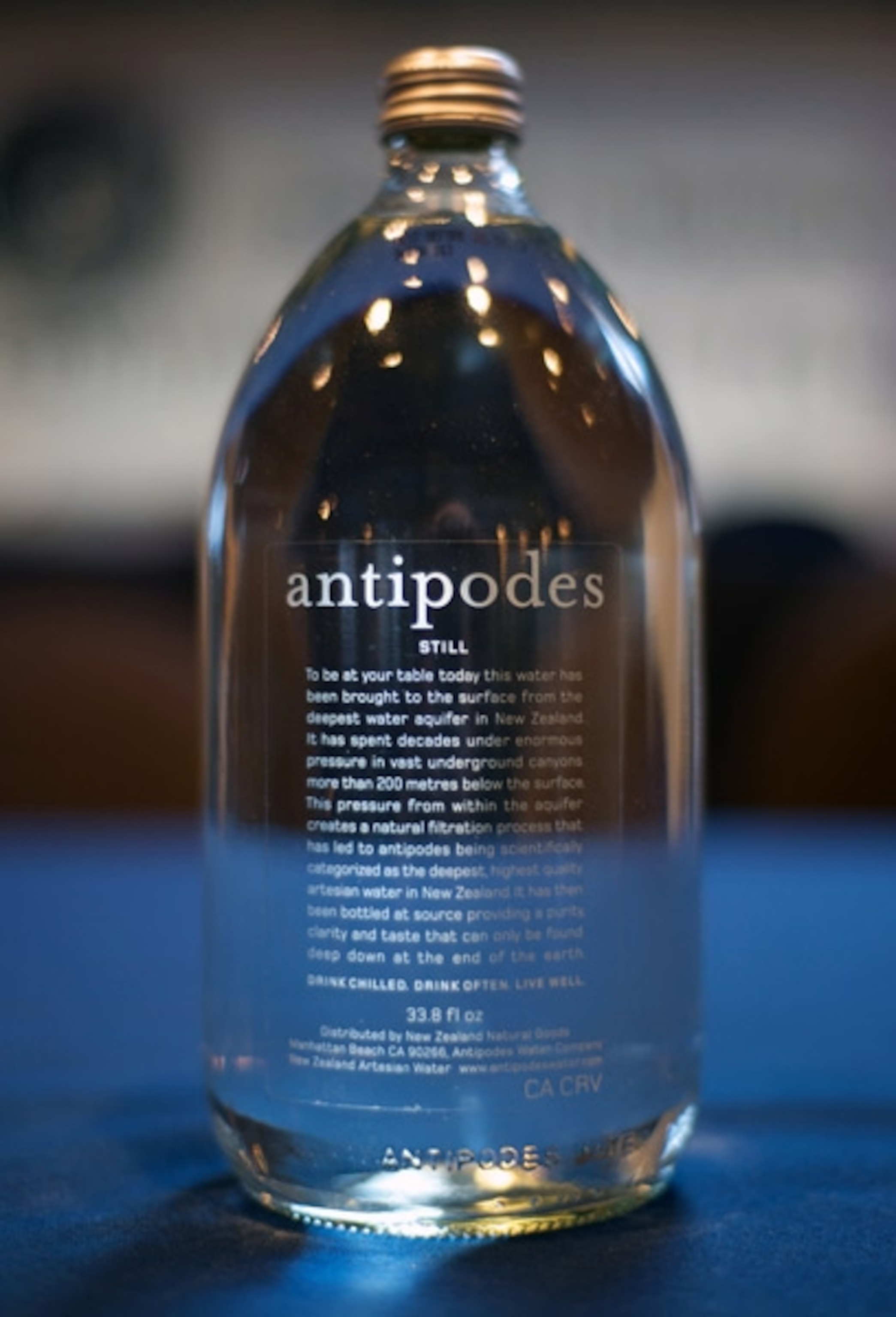 A bottle with text on a clear label