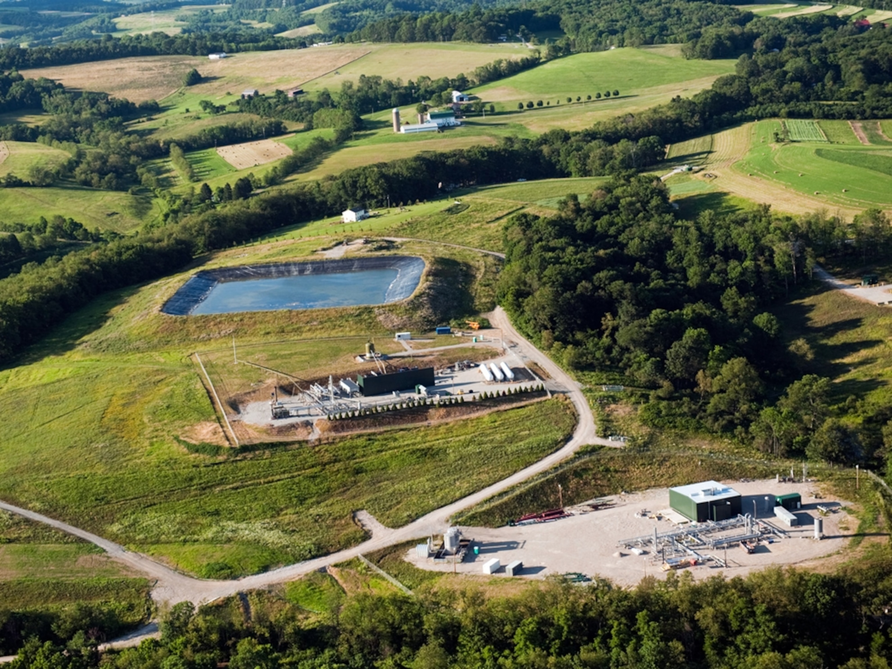 The Hallowich family's home in Hickory, Pennsylvania, is surrounded by energy company operations.