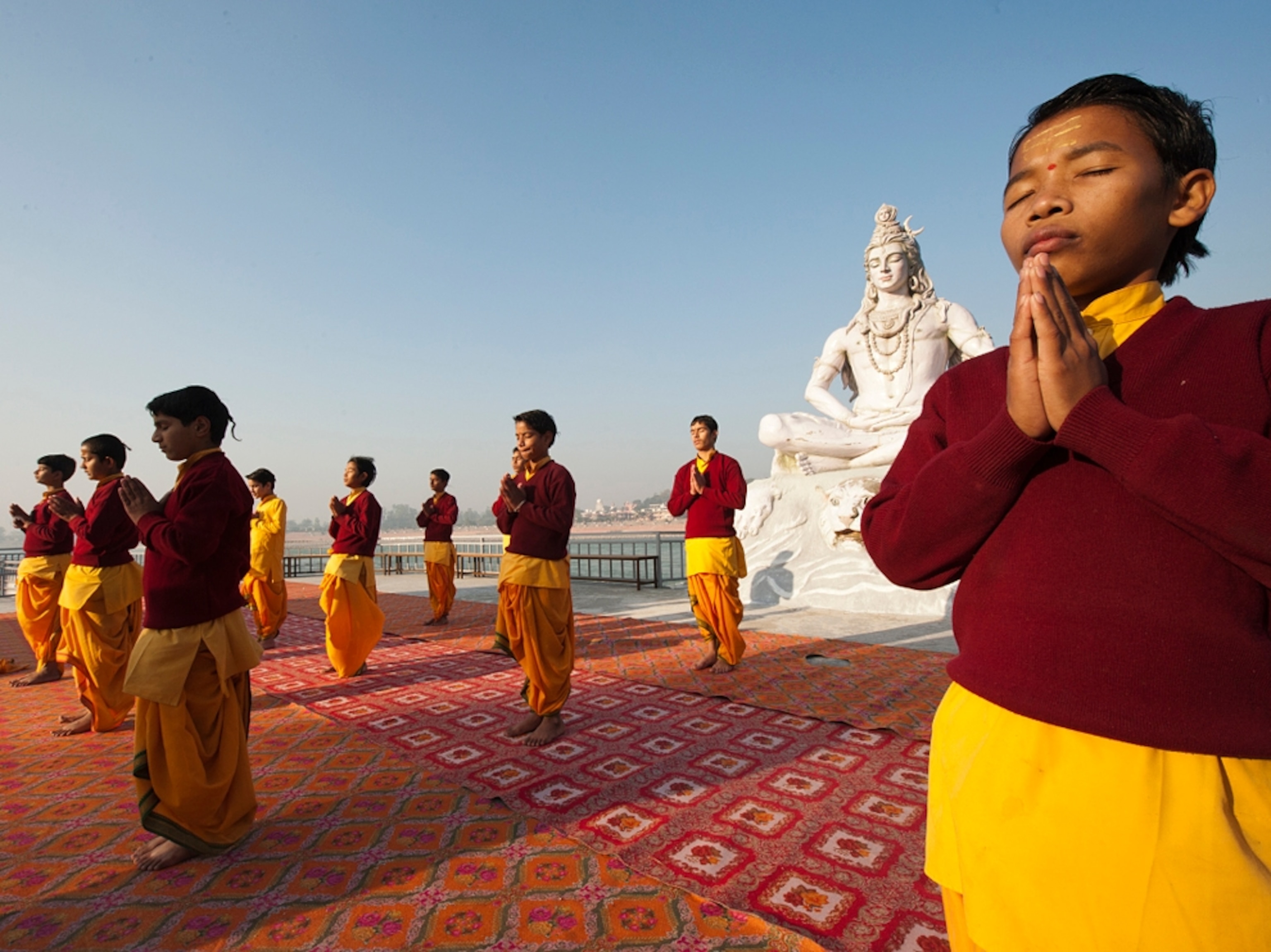 Orphaned boys practice yoga