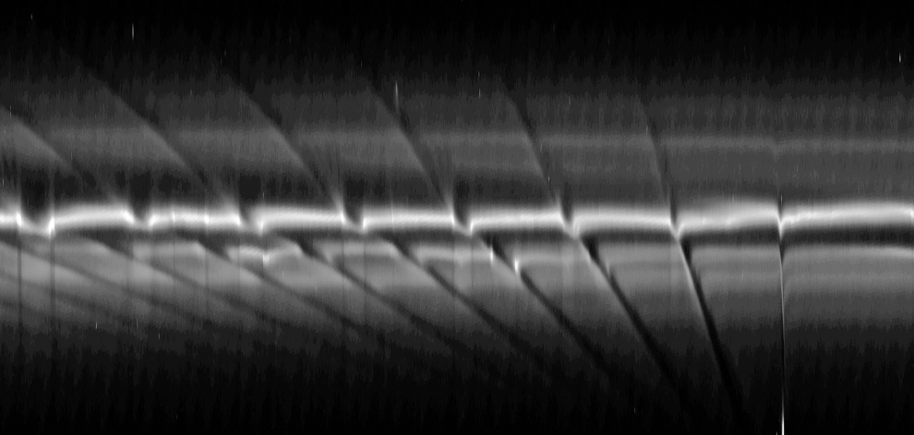 A picture of fan-like structures in Saturn's F ring.
