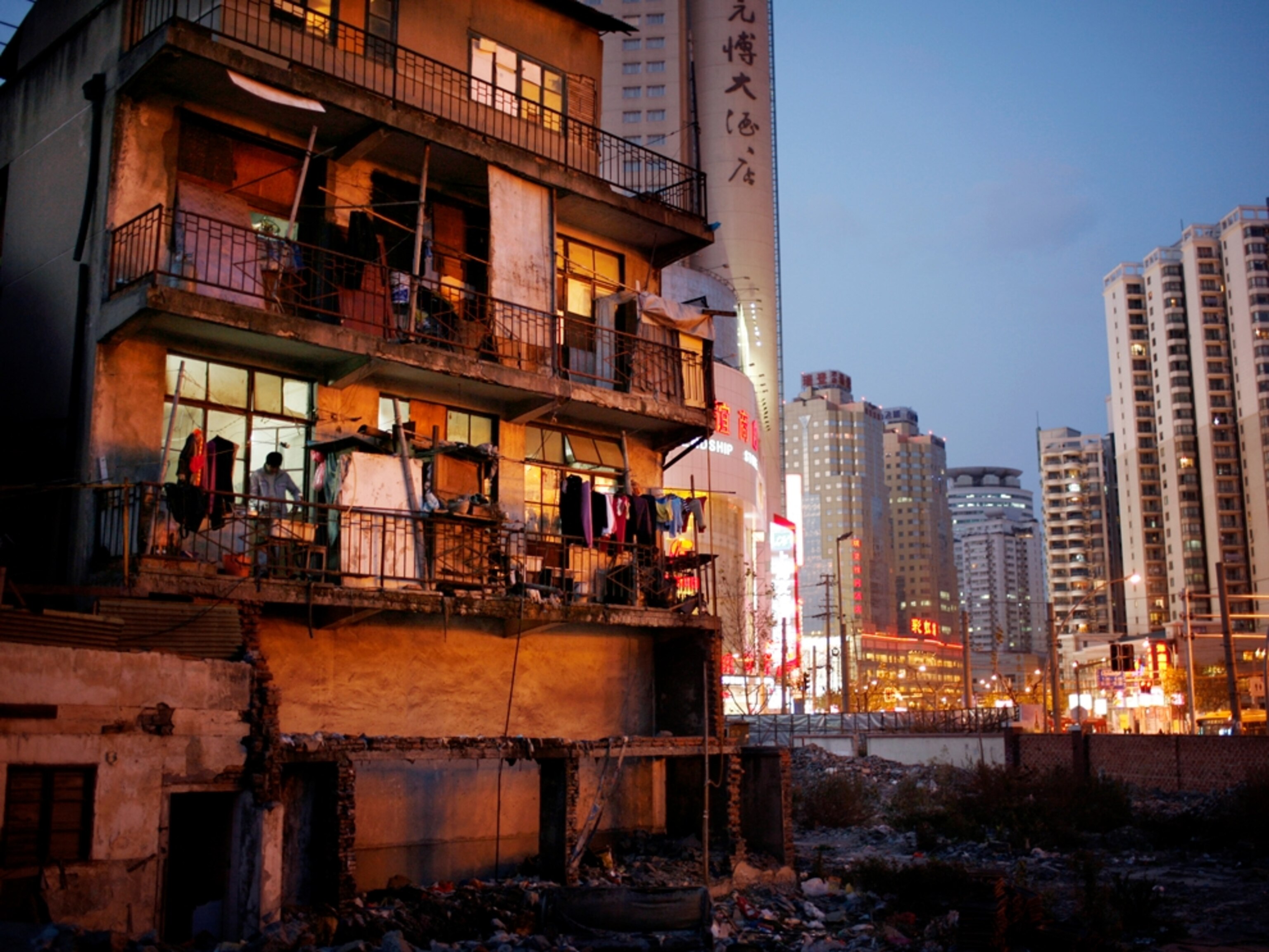 Old apartment building next to construction site