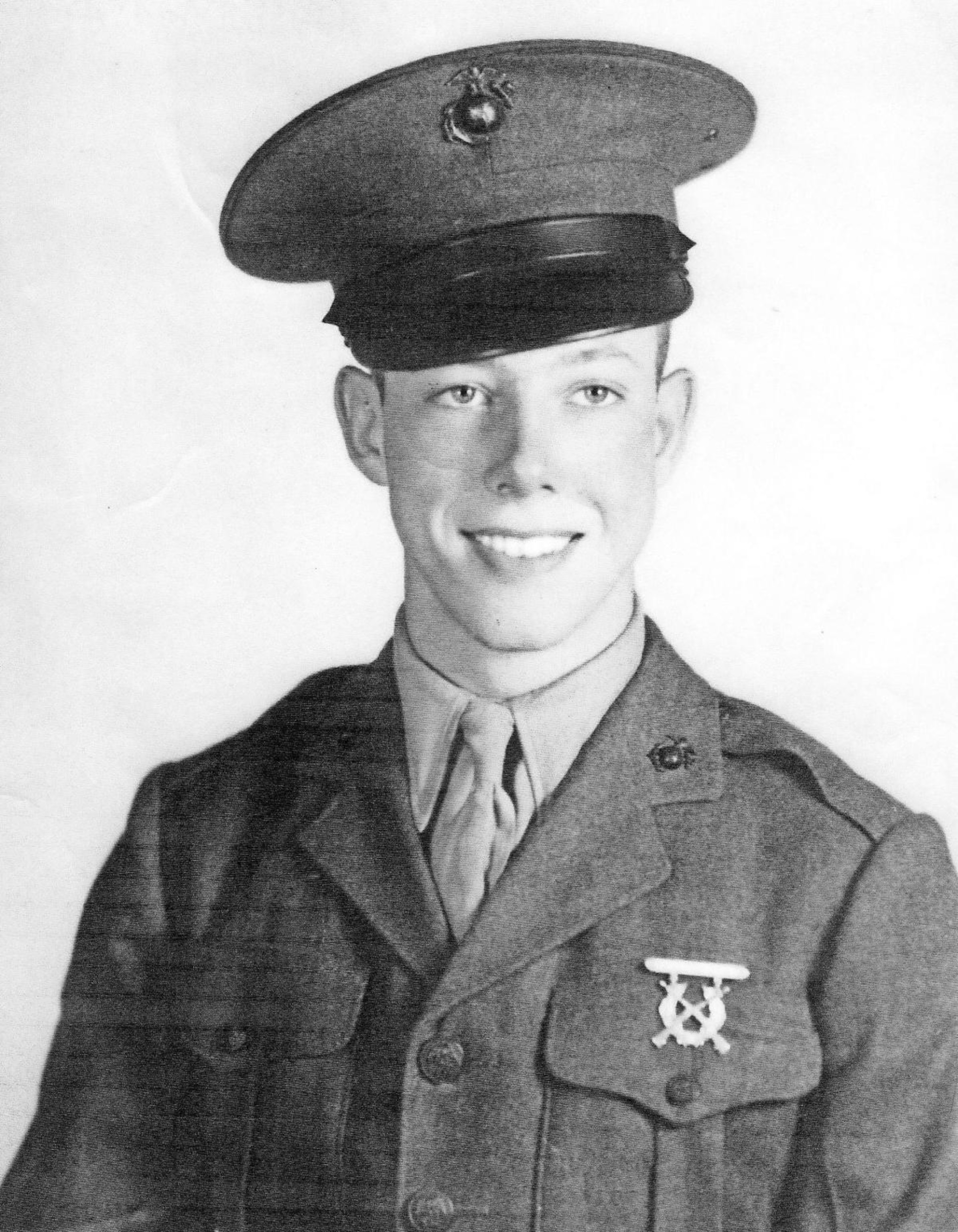 a young man in military uniform