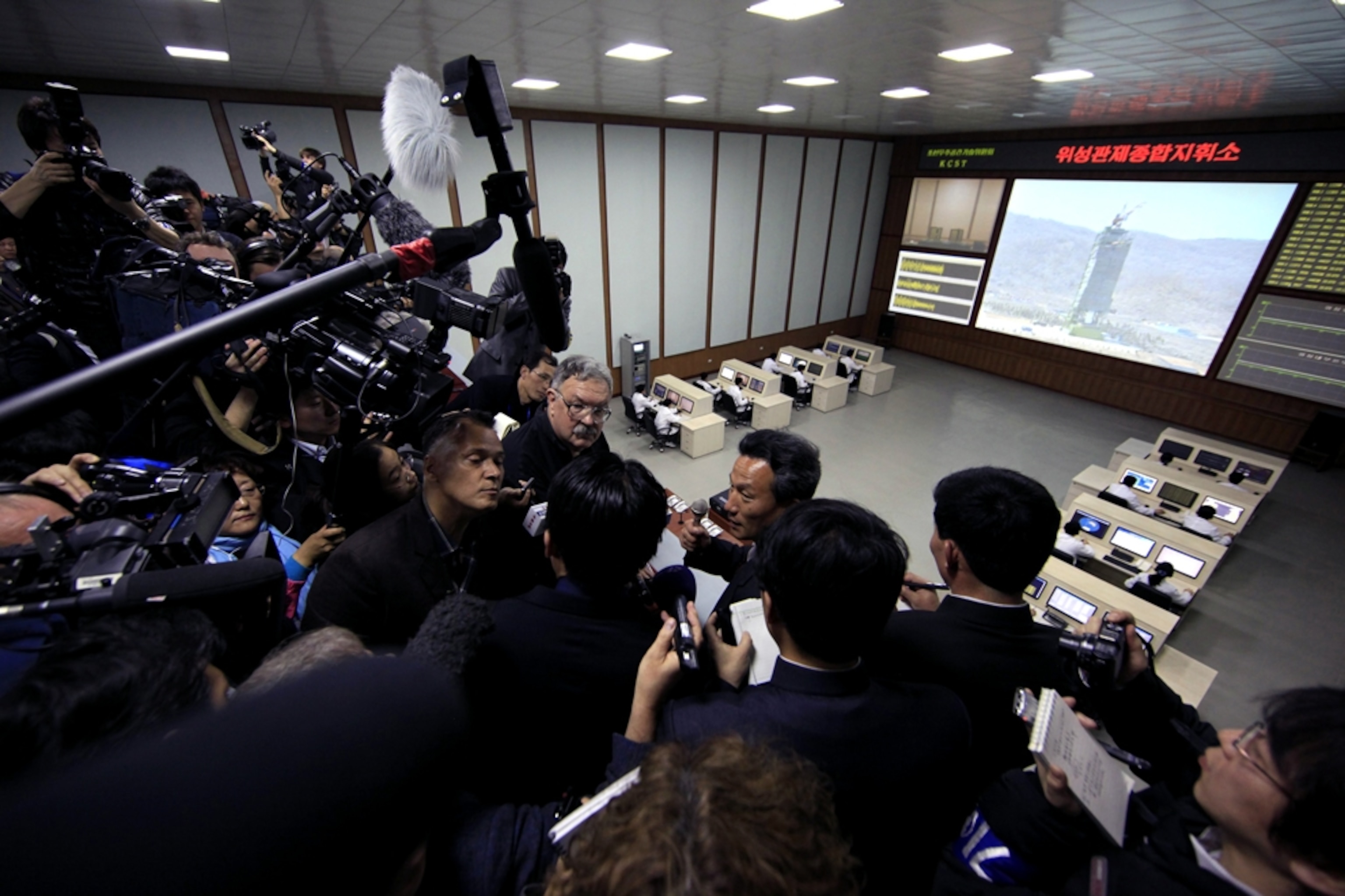 North Korea rocket picture: journalists in the launch command center
