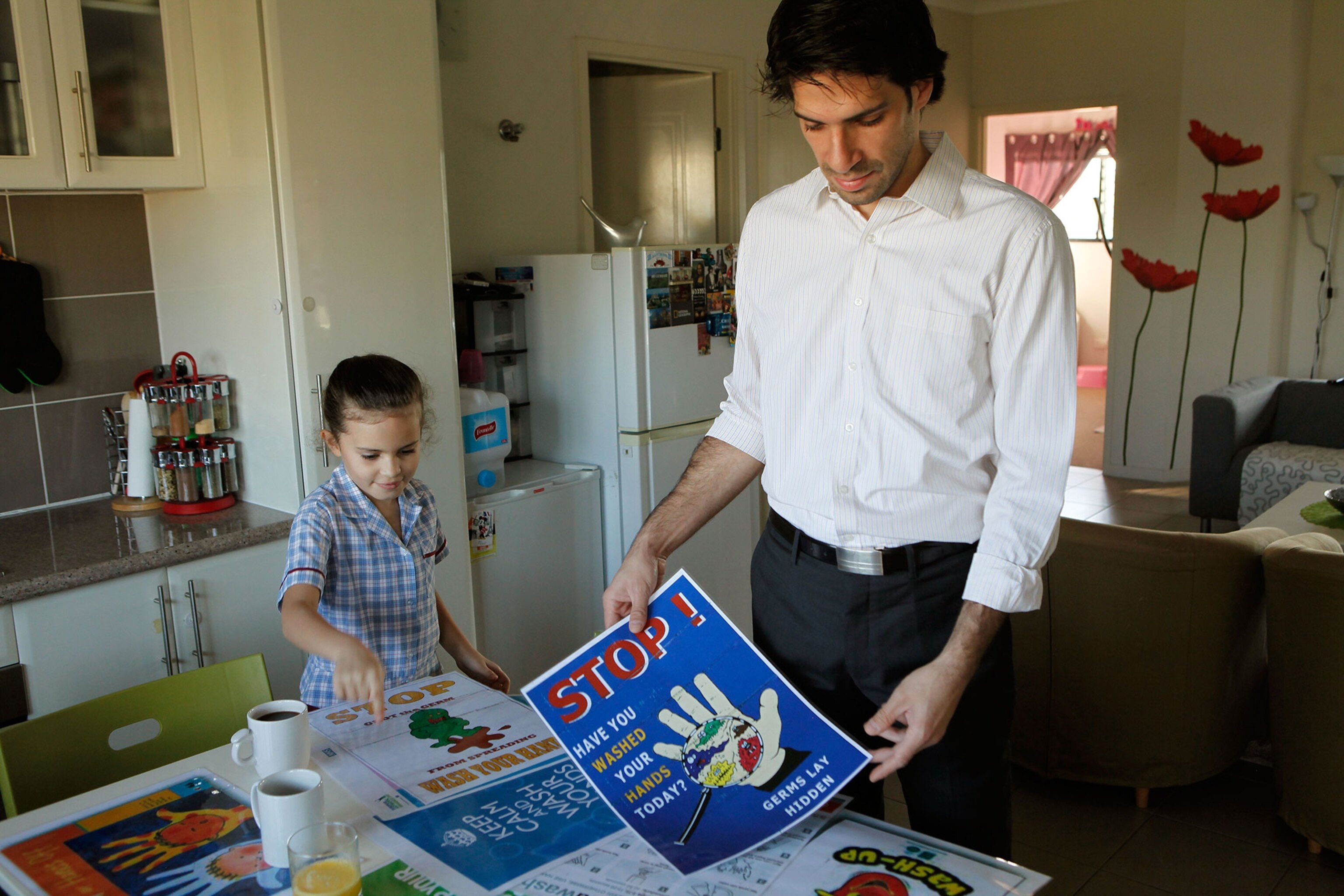 Hosam Zowawi and his daughter