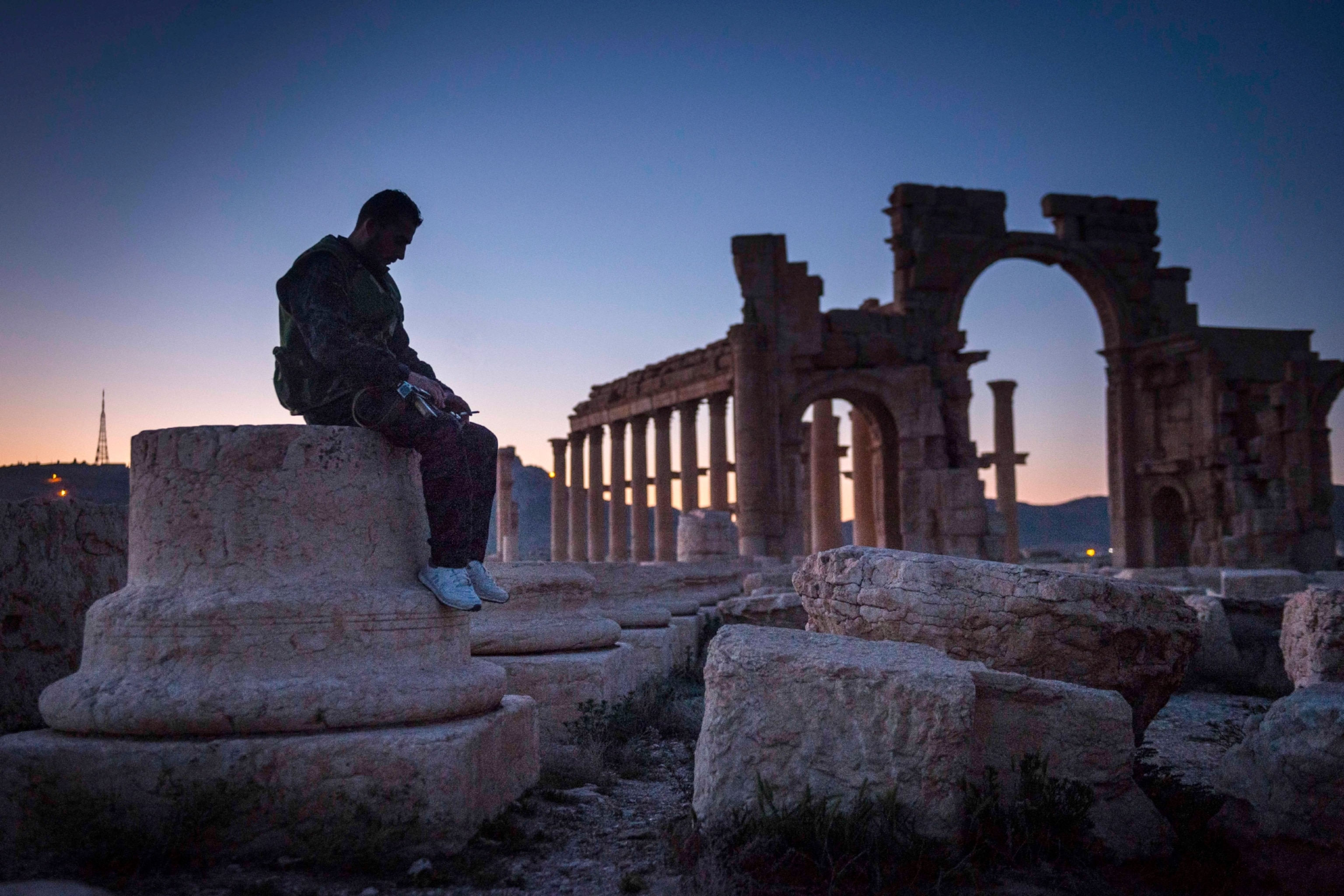 A Syrian soldier guards Palmyra from ISIS