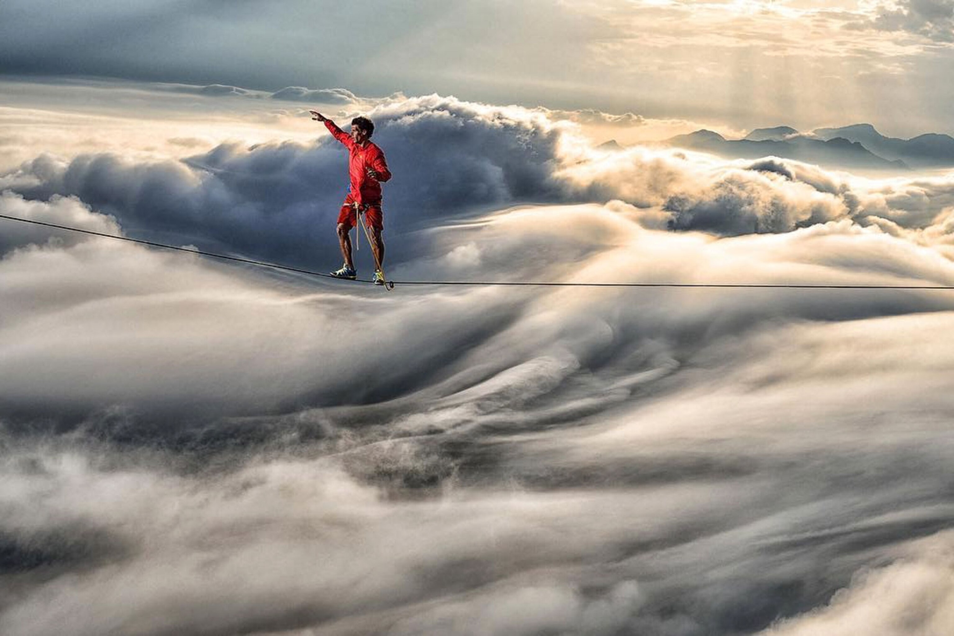 a person highlining above Rio de Janeiro, Brazil
