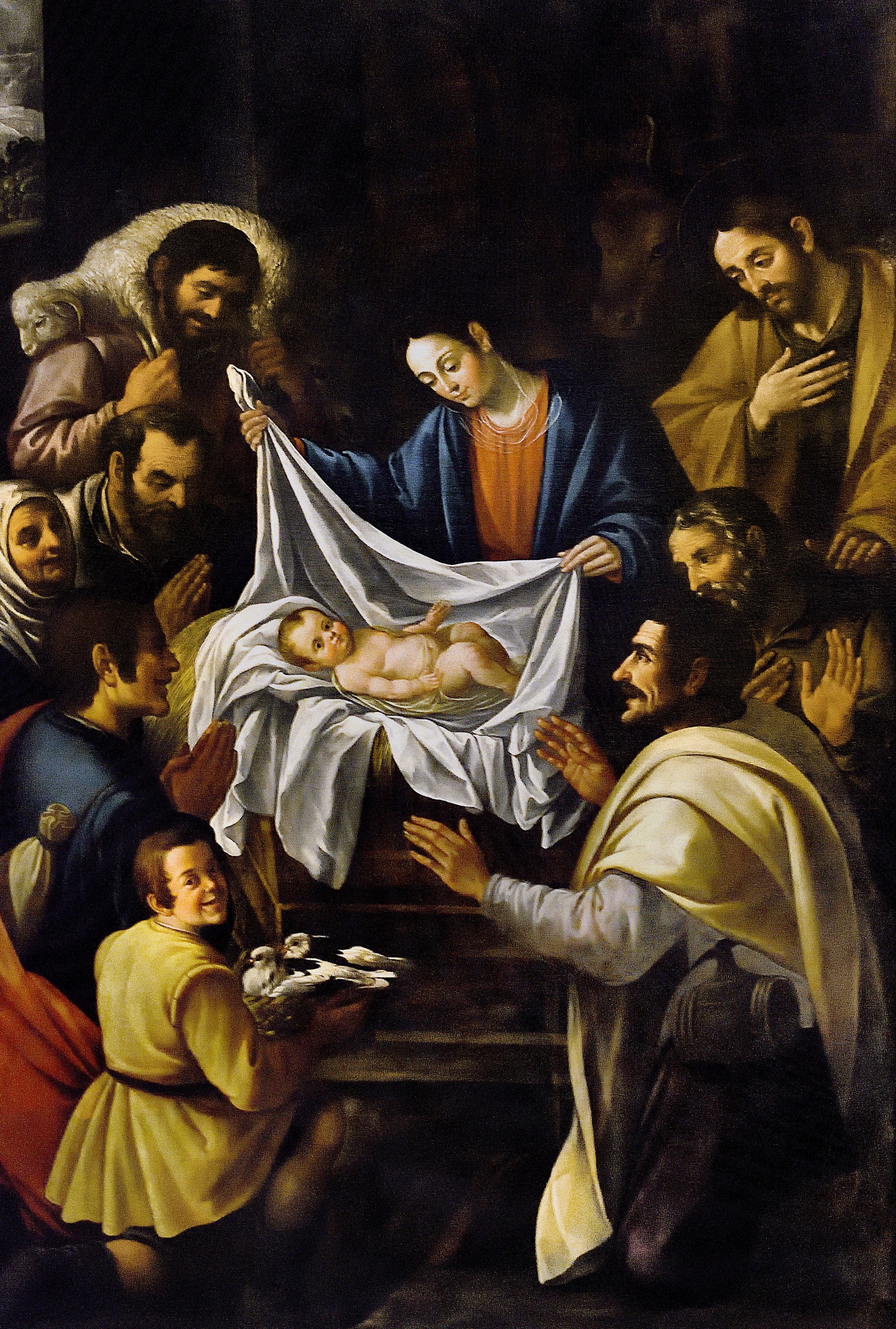 An oil canvas panting of Virgin Mary holding baby Jesus.