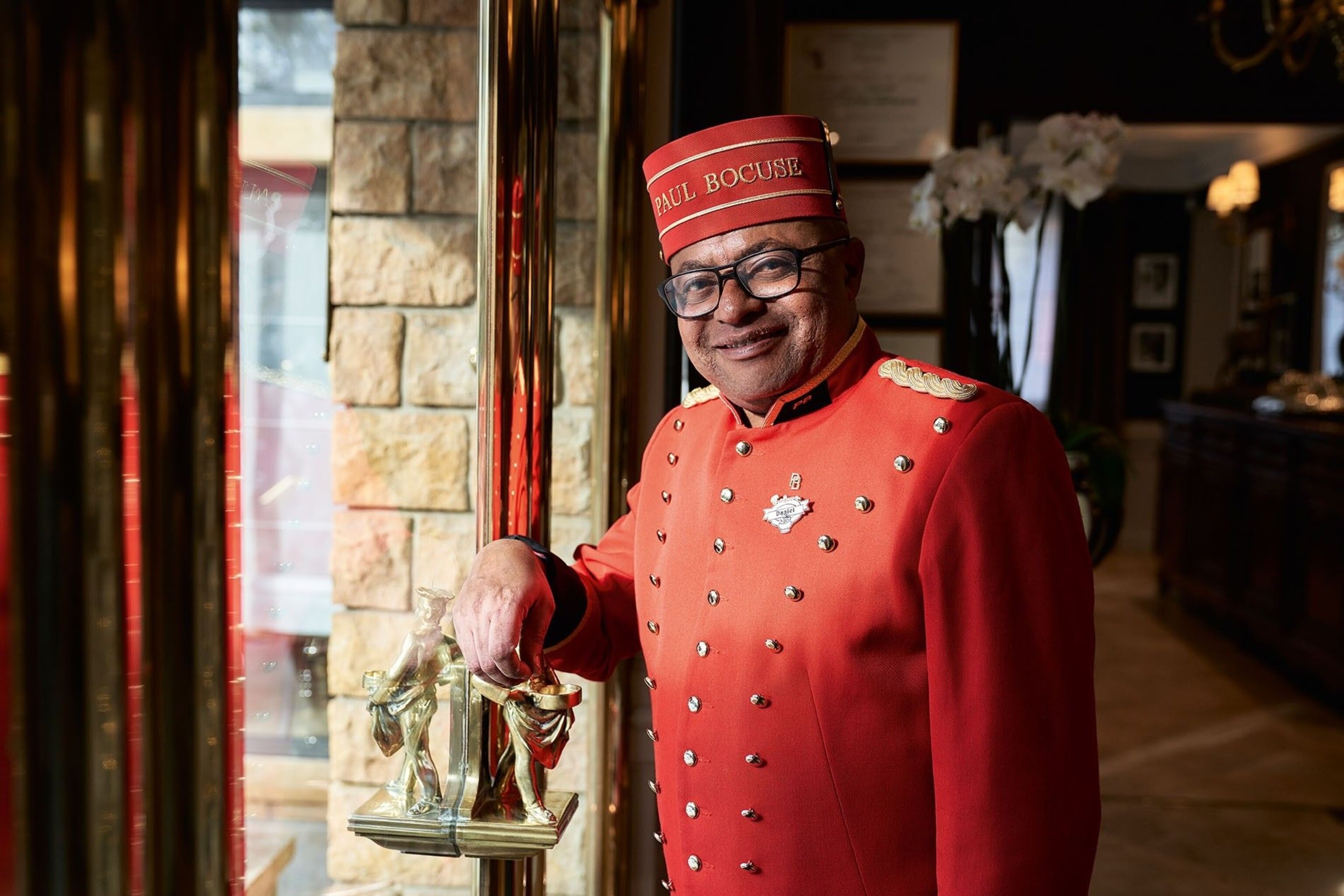 Daniel Abdallah groom/doorman at Paul Bocuse’s L’Auberge du Pont de Collonges.
