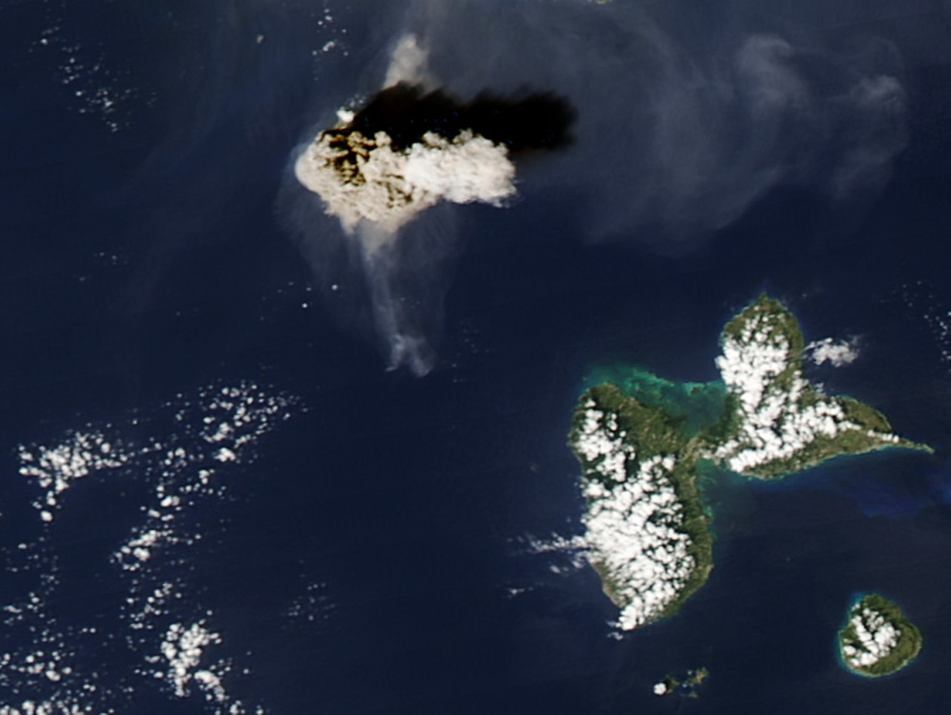 A partial dome collapse of the Soufrière Hills volcano creates a huge plume, seen in a satellite picture.