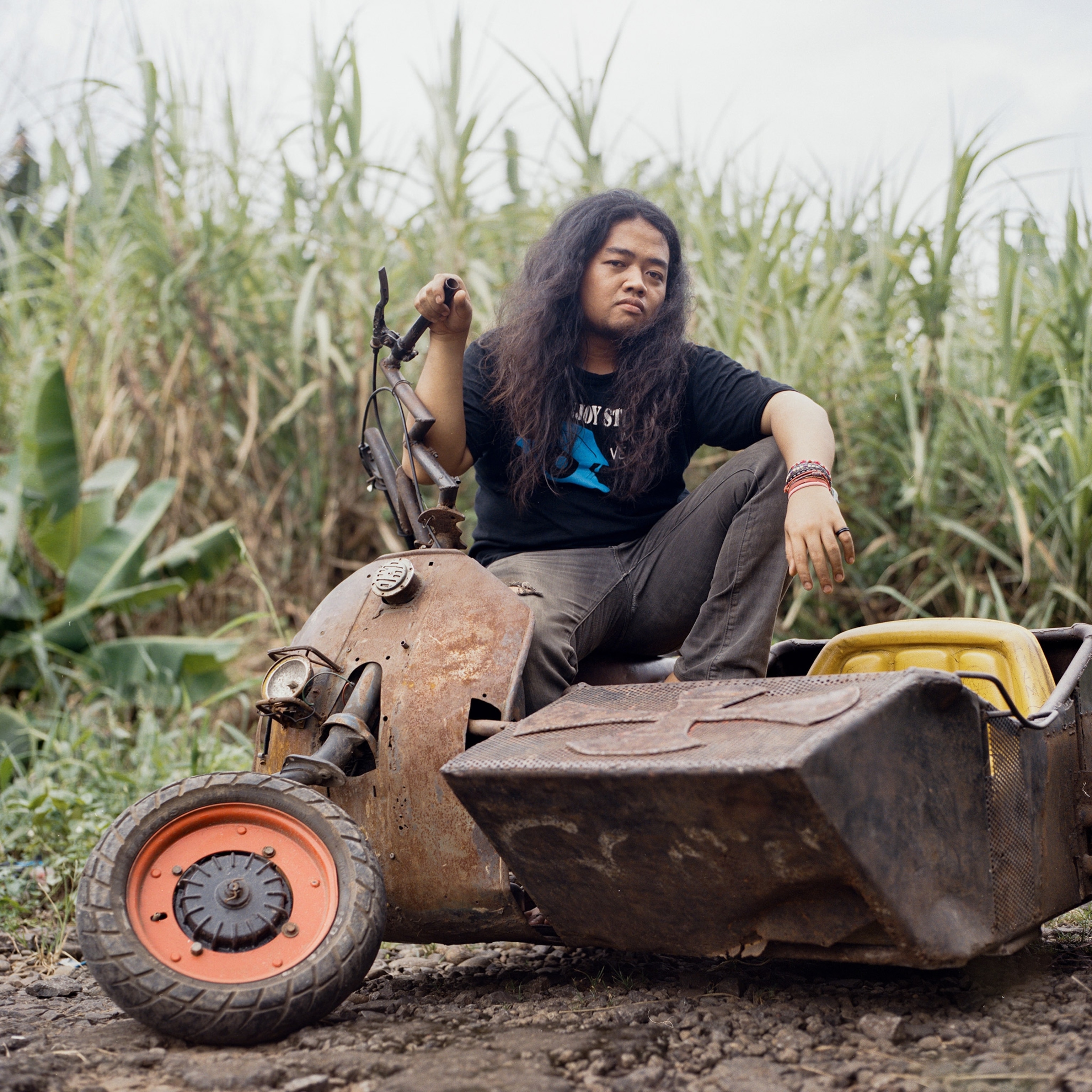 a person on a vespa extreme in Indonesia