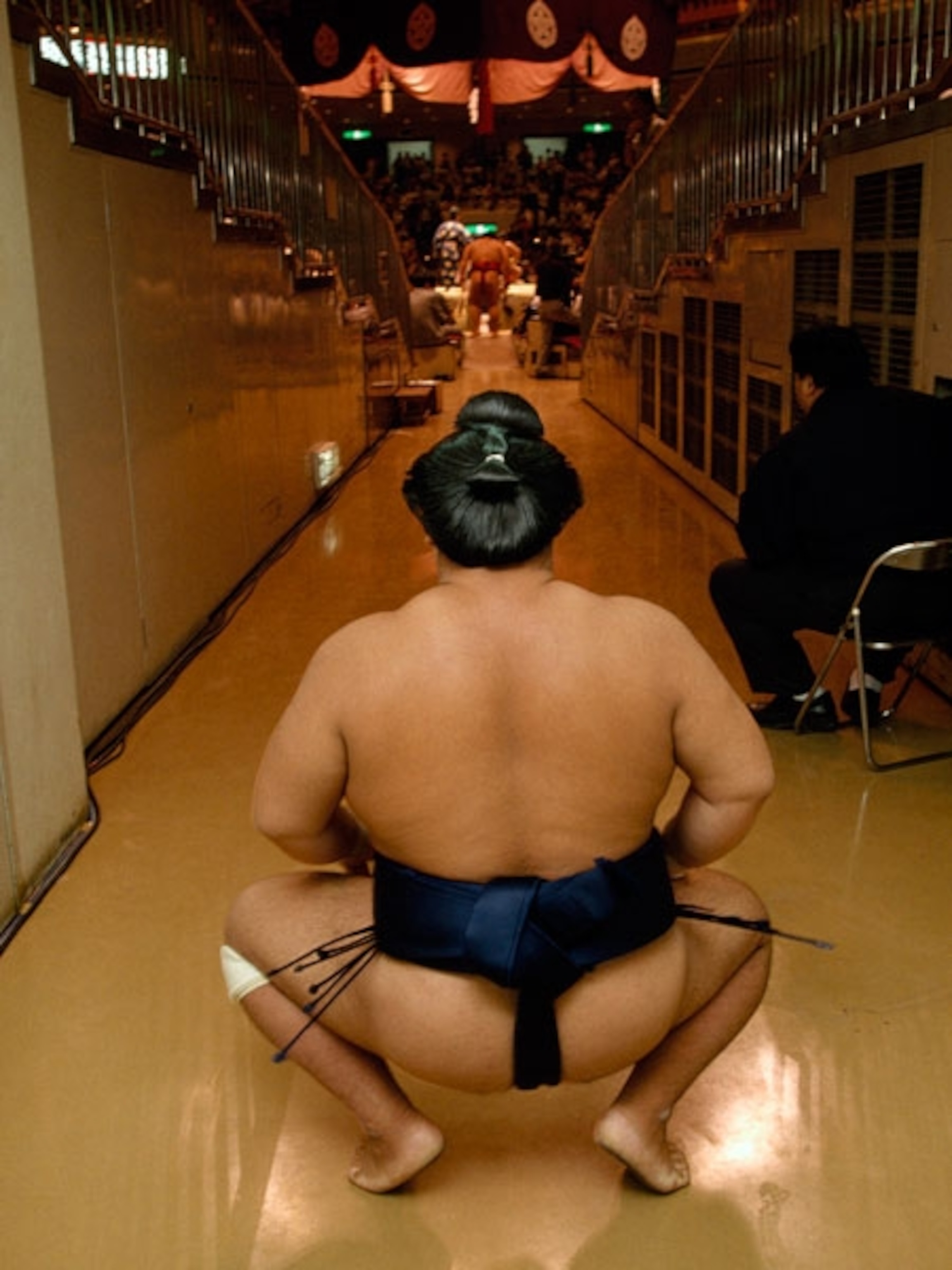 Sumo wrestler crouching