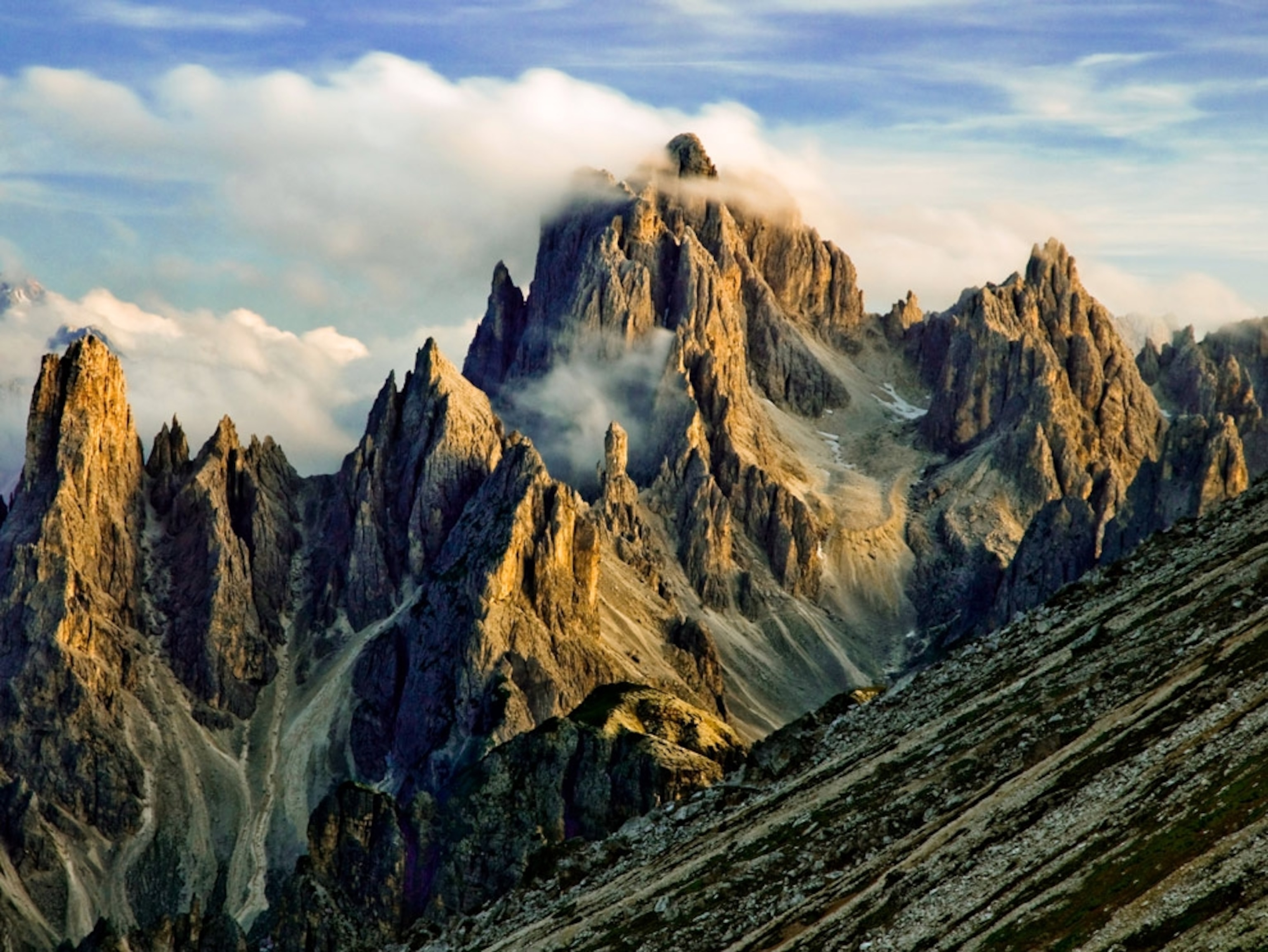 Clouds floating through mountain peaks