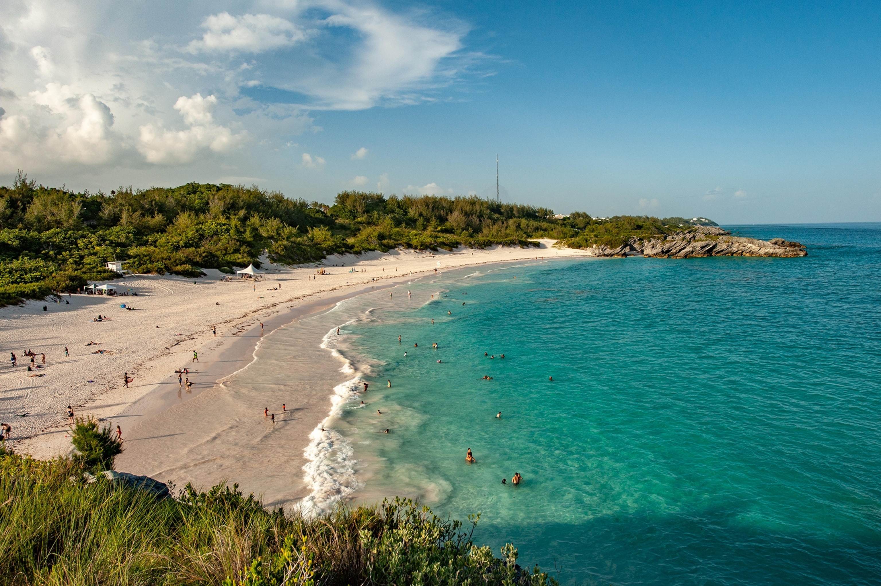 Bermuda beach and the aquamarine waters of King's Wharf and Horseshoe Bay - one of the prettiest tropical beaches with pink sand in the world.