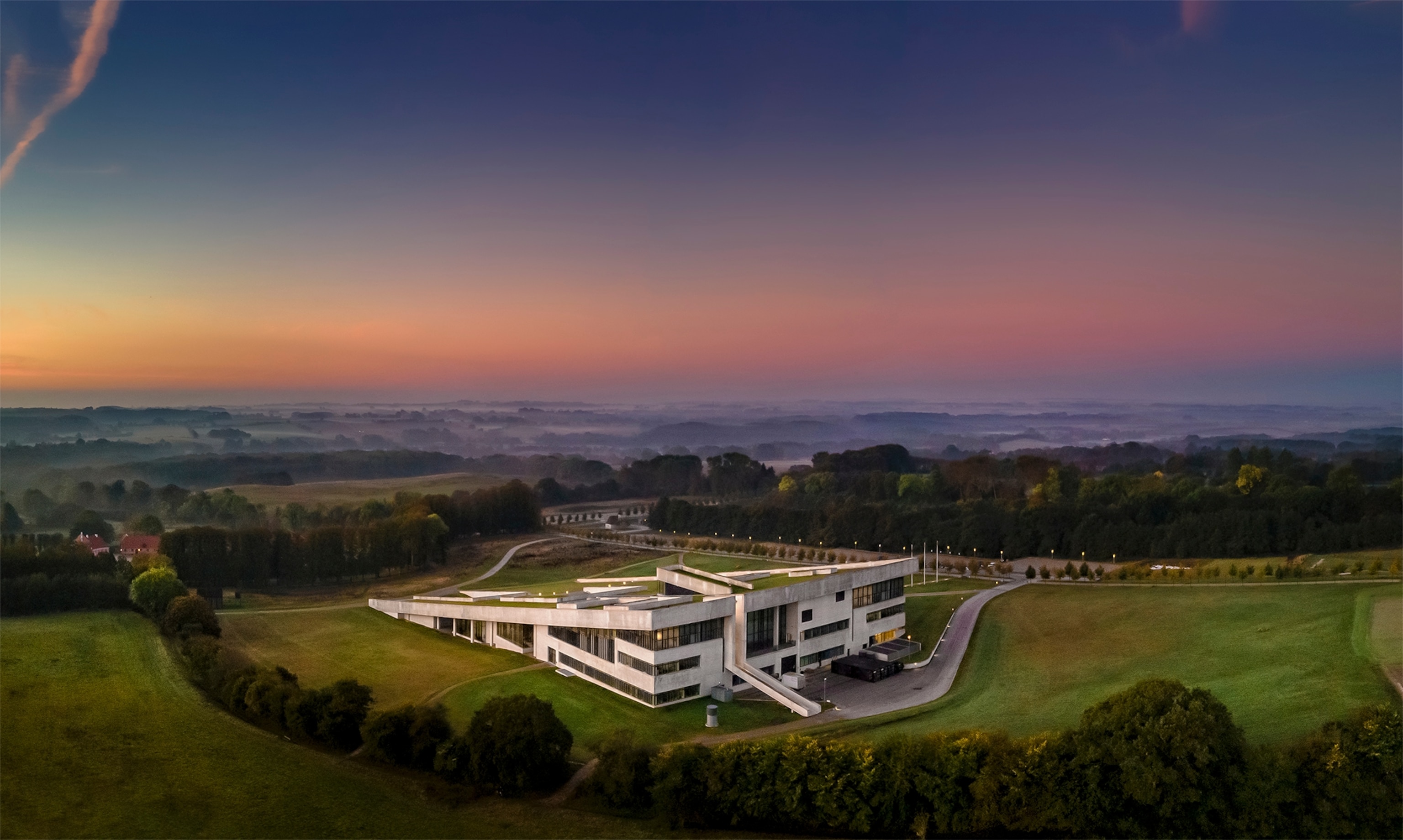 Moesgaard Museum, located near Aarhus, Denmark, is renowned for its striking modern architecture and immersive exhibitions. It focuses on archaeology and ethnography, bringing ancient history to life with innovative storytelling and technology. Highlights include the well-preserved Grauballe Man and Viking-era artifacts. Set in scenic surroundings, the museum offers both indoor and outdoor experiences that bridge past and present.