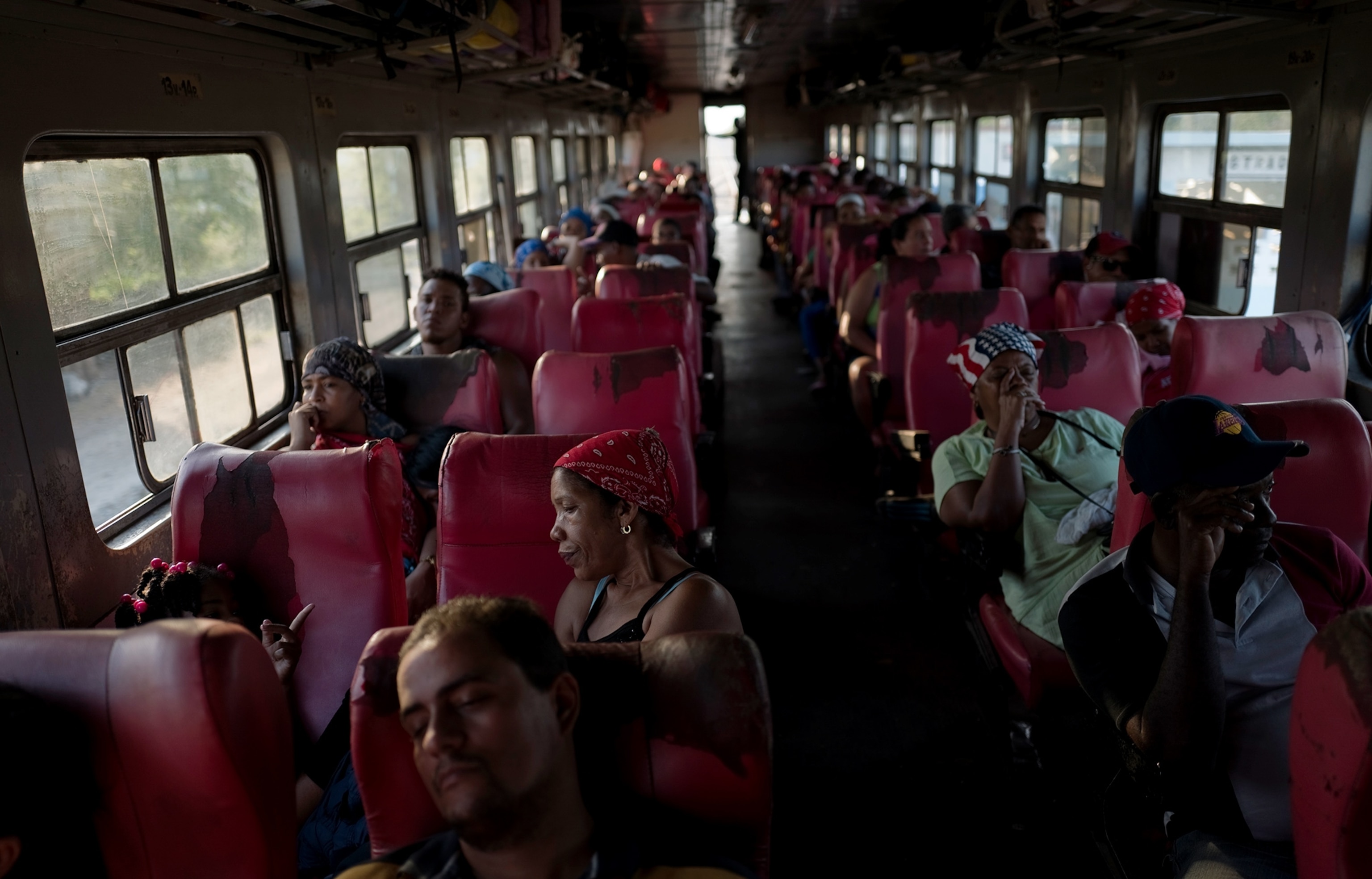 passengers on a train in Cuba