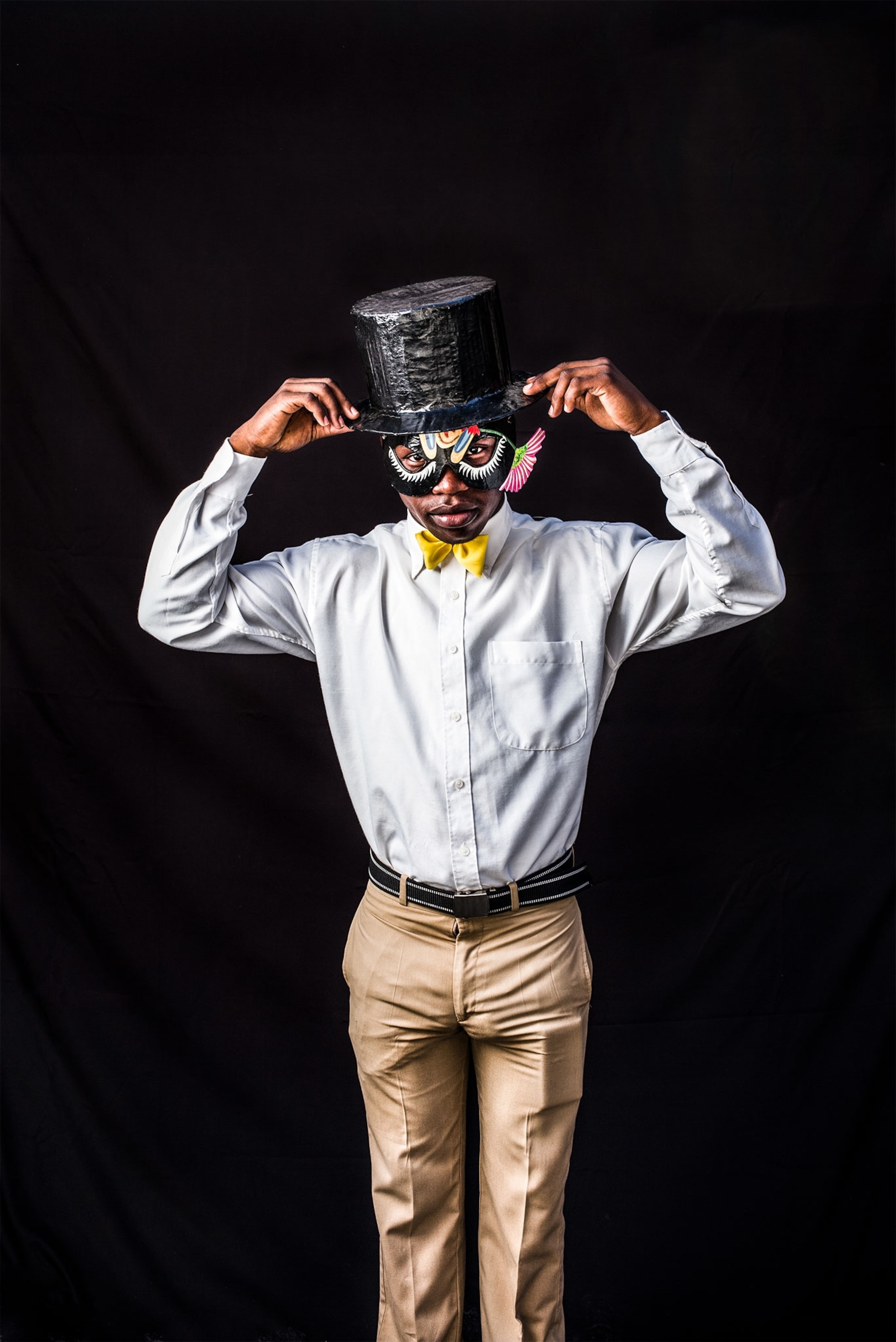 a boy wearing a top hat
