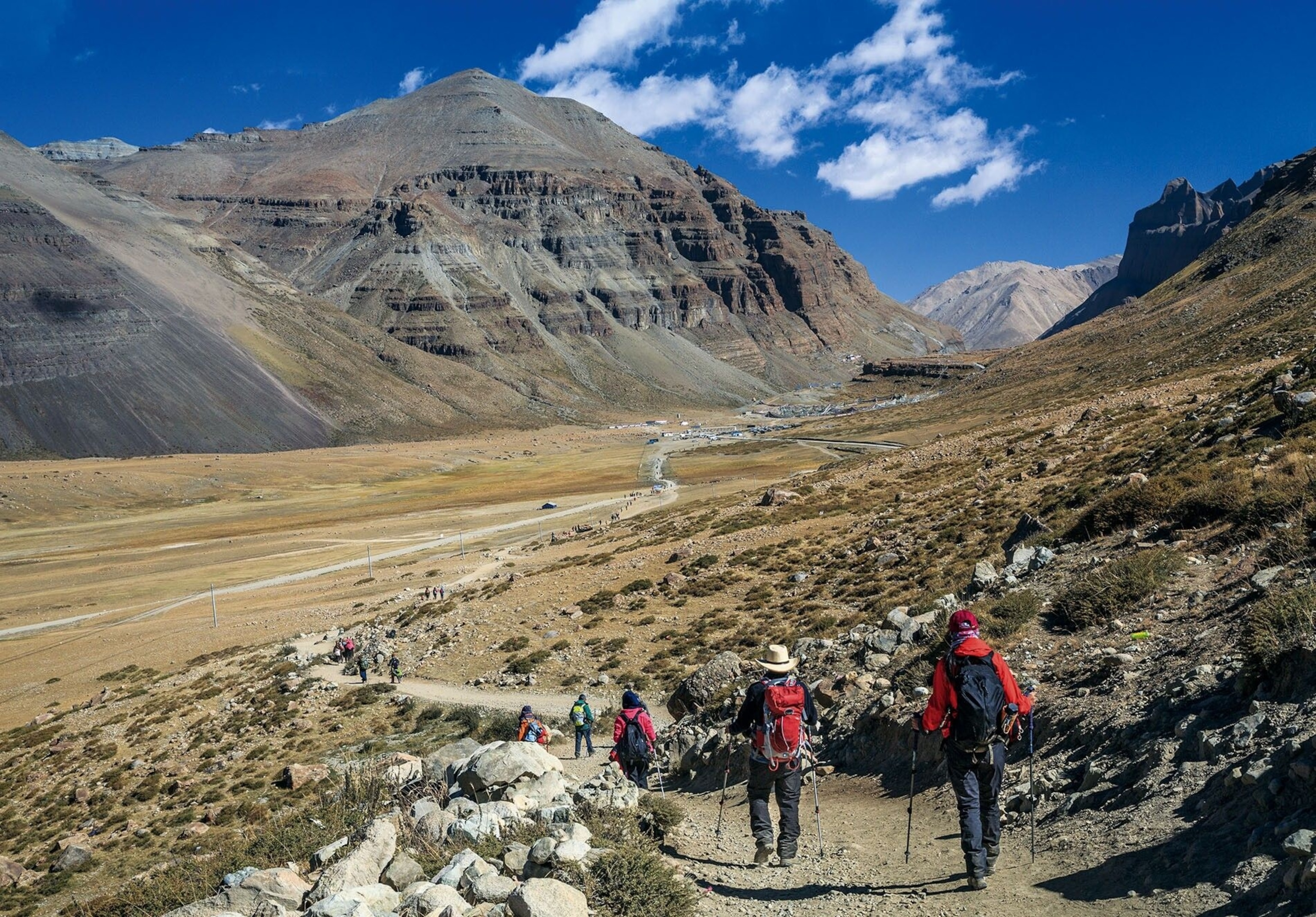 Hikers in the Tibet Autonomous Region on a kora (a type of pilgrimage), circumambulating Mount Kailash, sacred to Bon, Buddhism, Hinduism and Jainism.