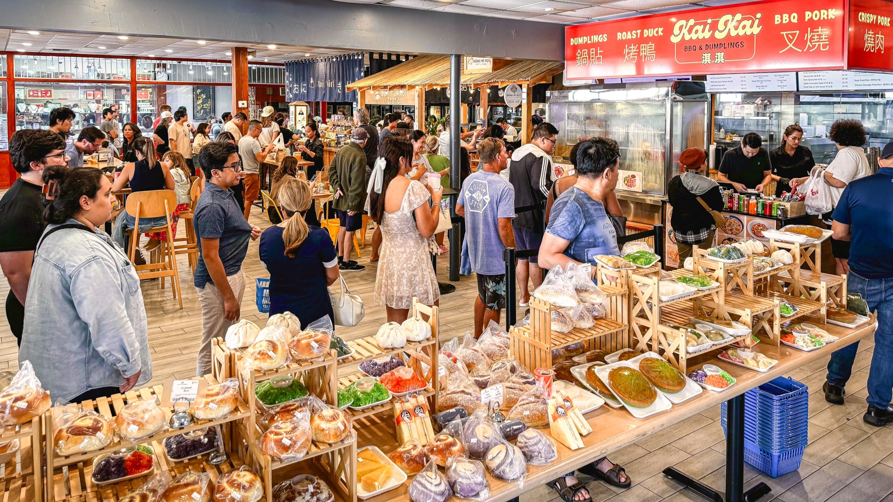 Dozens of patrons inside an indoor market