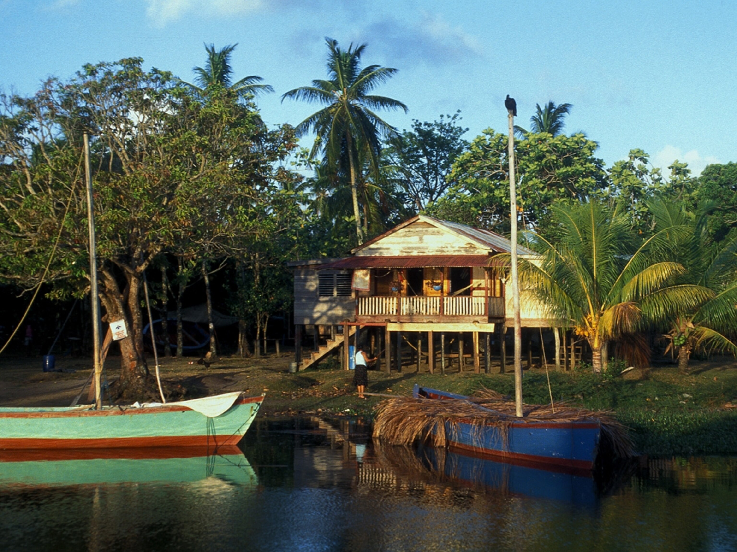 A resident of Tasbapauni, Nicaragua fixes a fence.