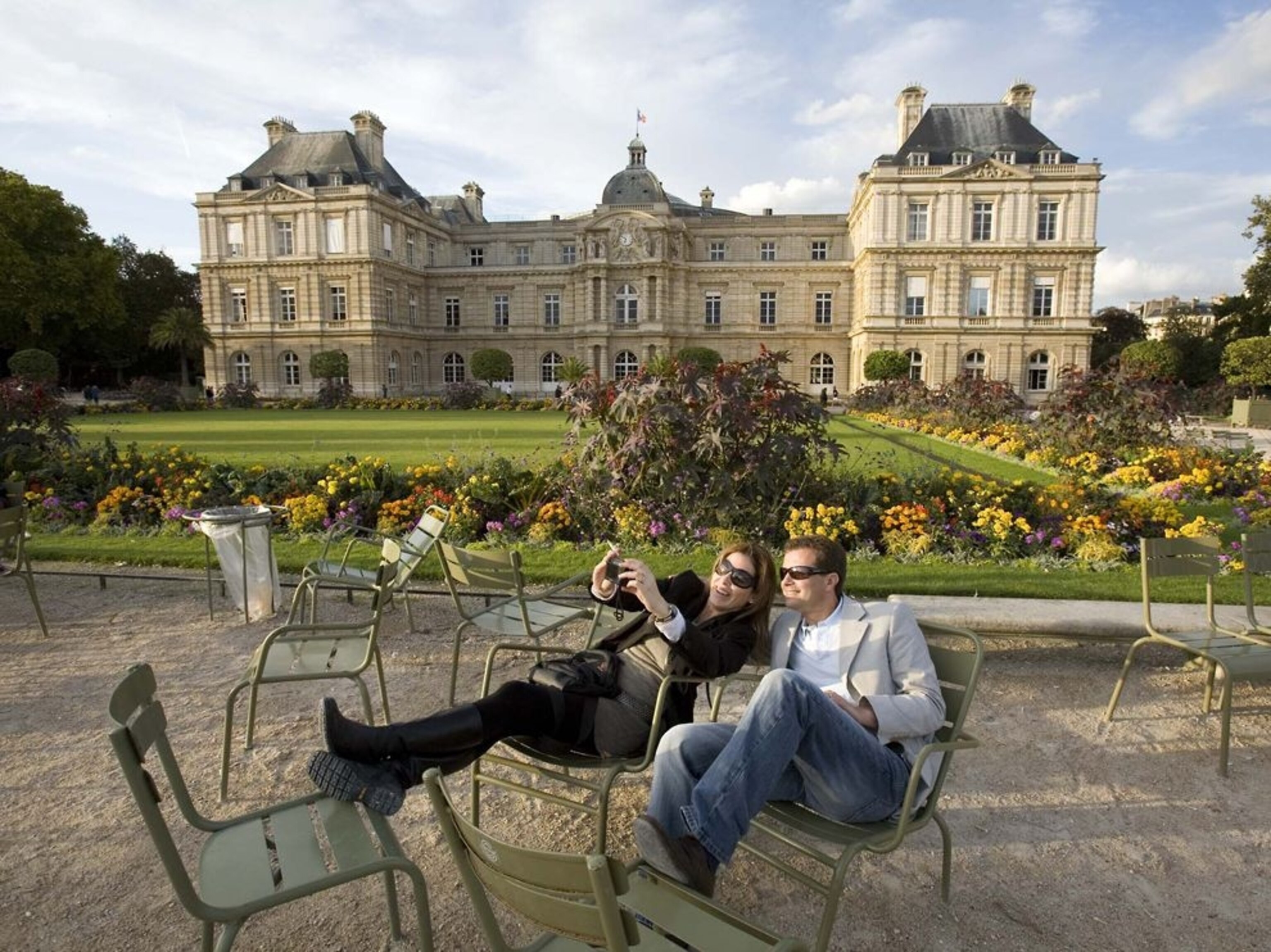 a couple in Luxembourg Garden Paris
