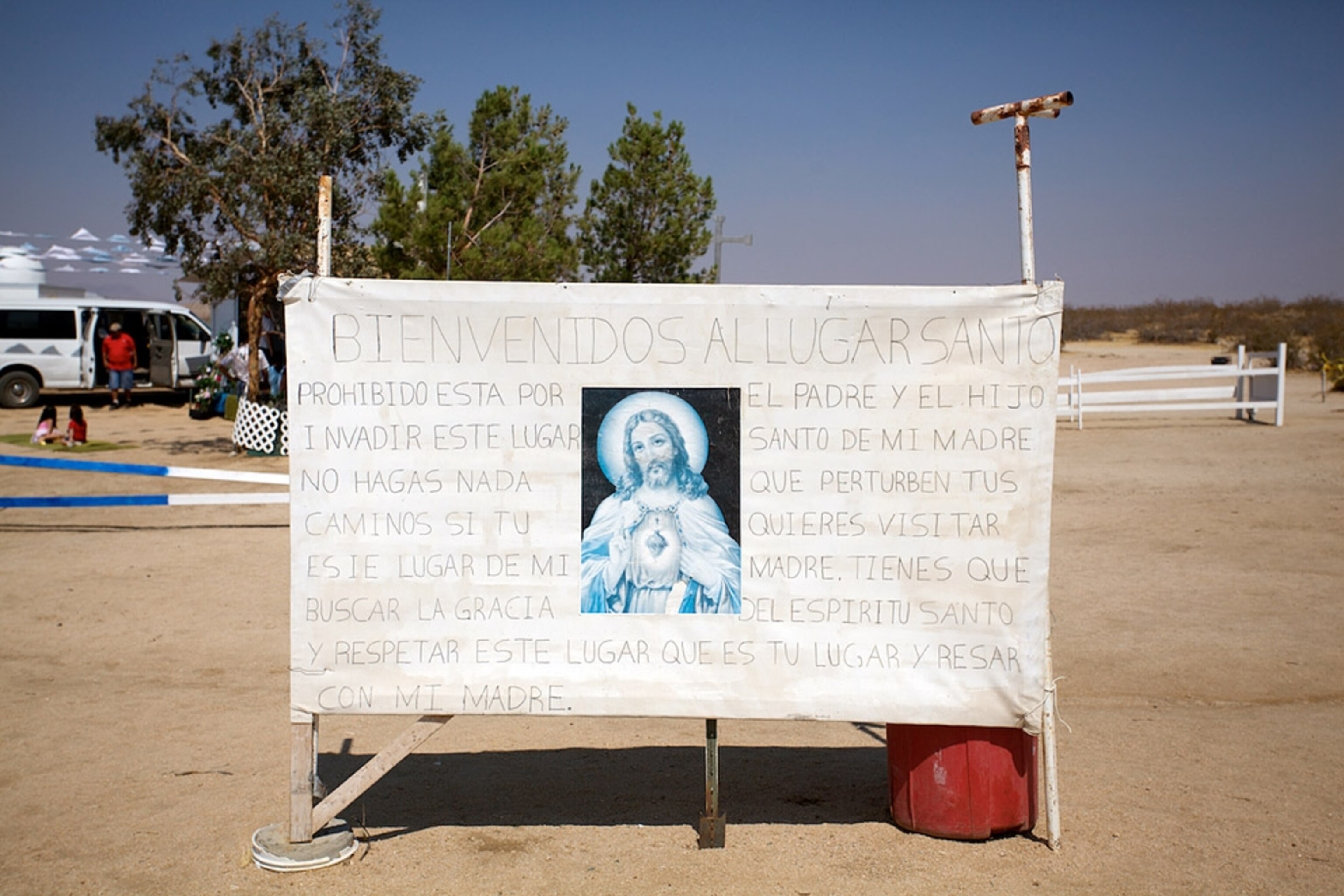 A welcome sign with an image of Jesus