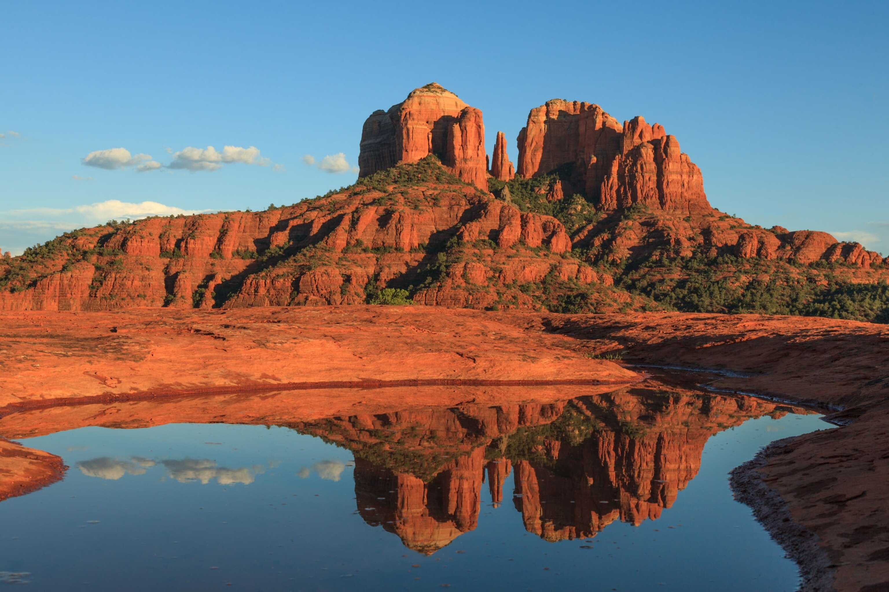 Cathedral Rock reflected in water in Sedona, Arizona.
