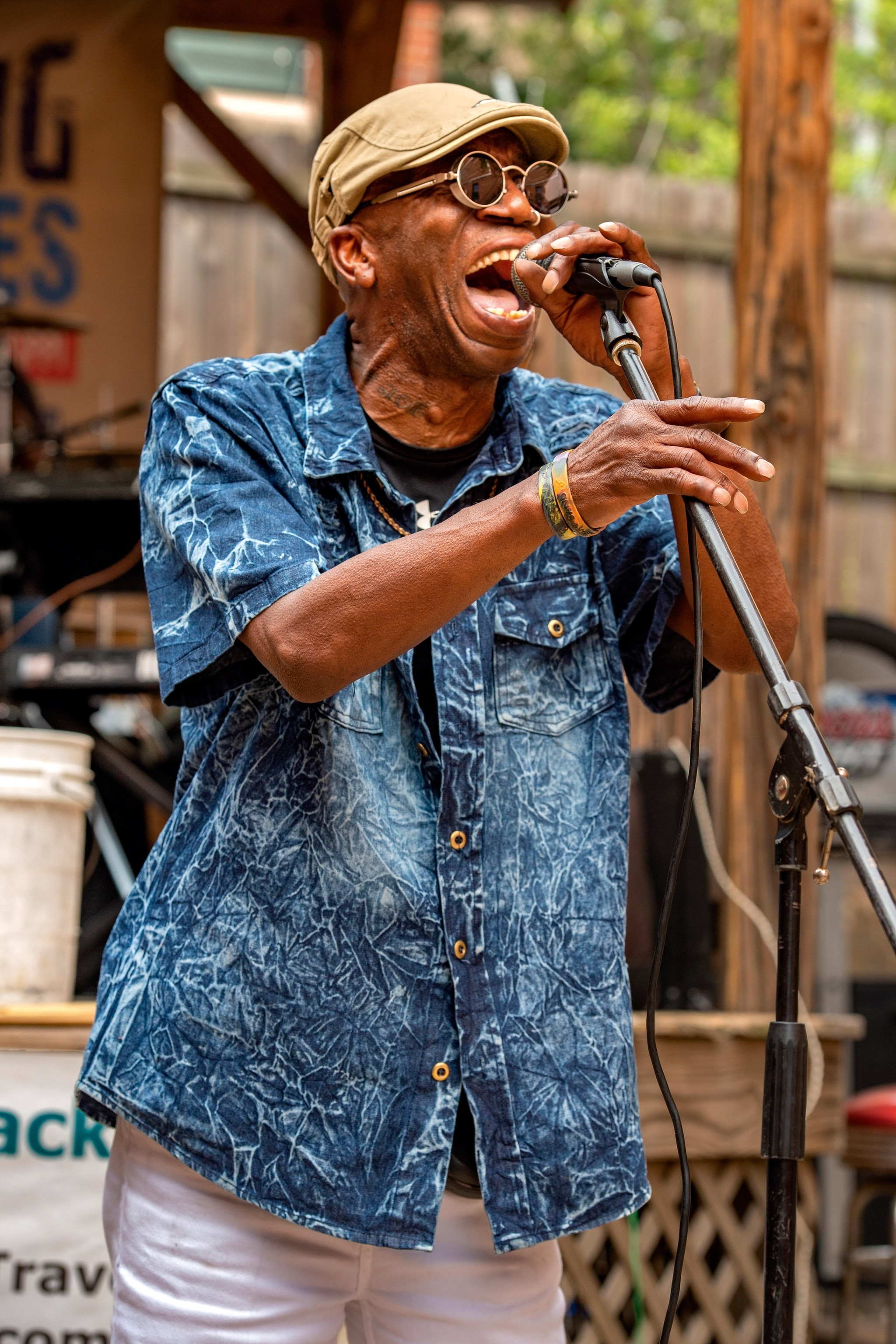 Man sings into microphone