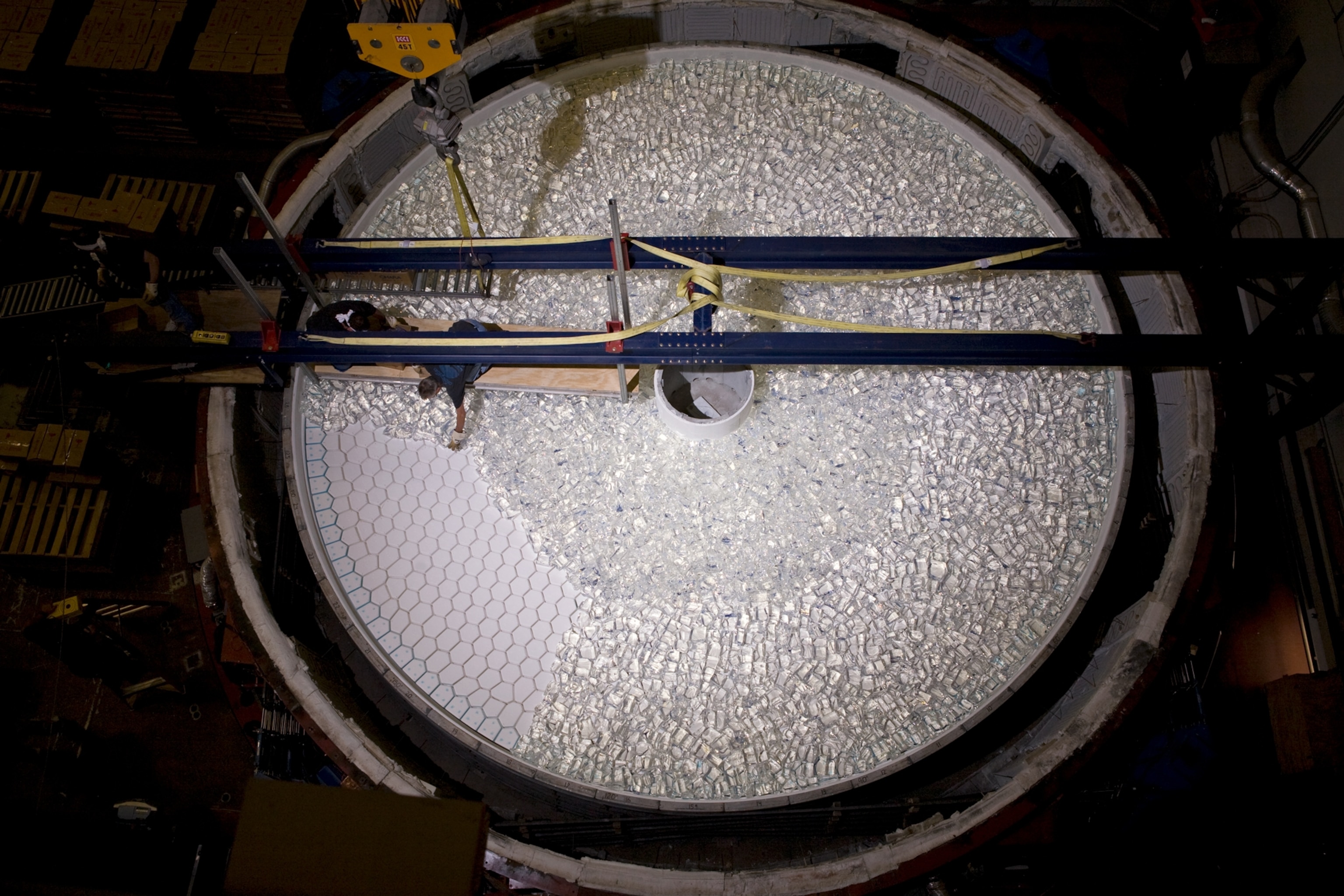 a telescope mirror mold working to create a concave surface