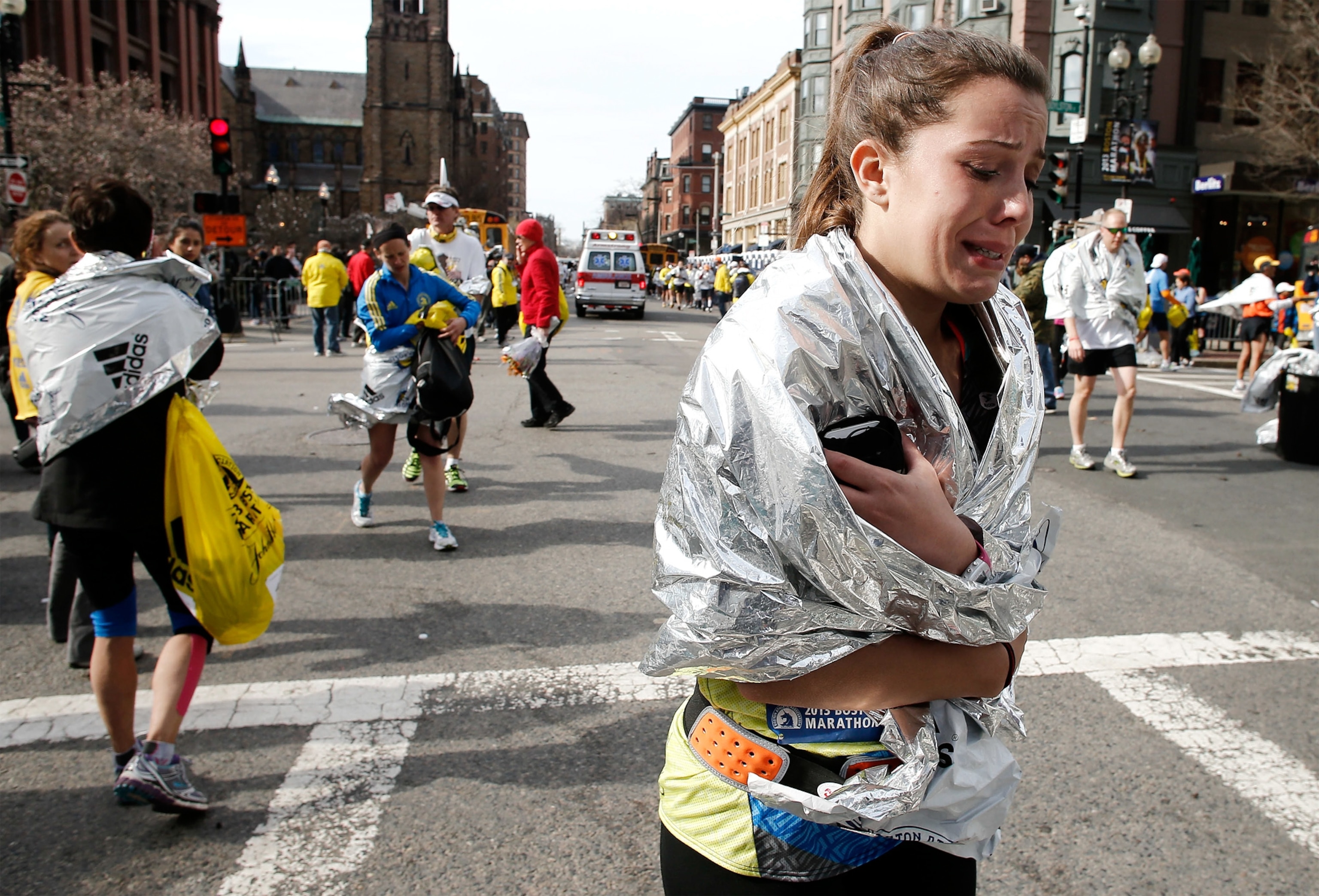 A runner cries after the Boston Marathon was bombed in Boston, Massachusetts.