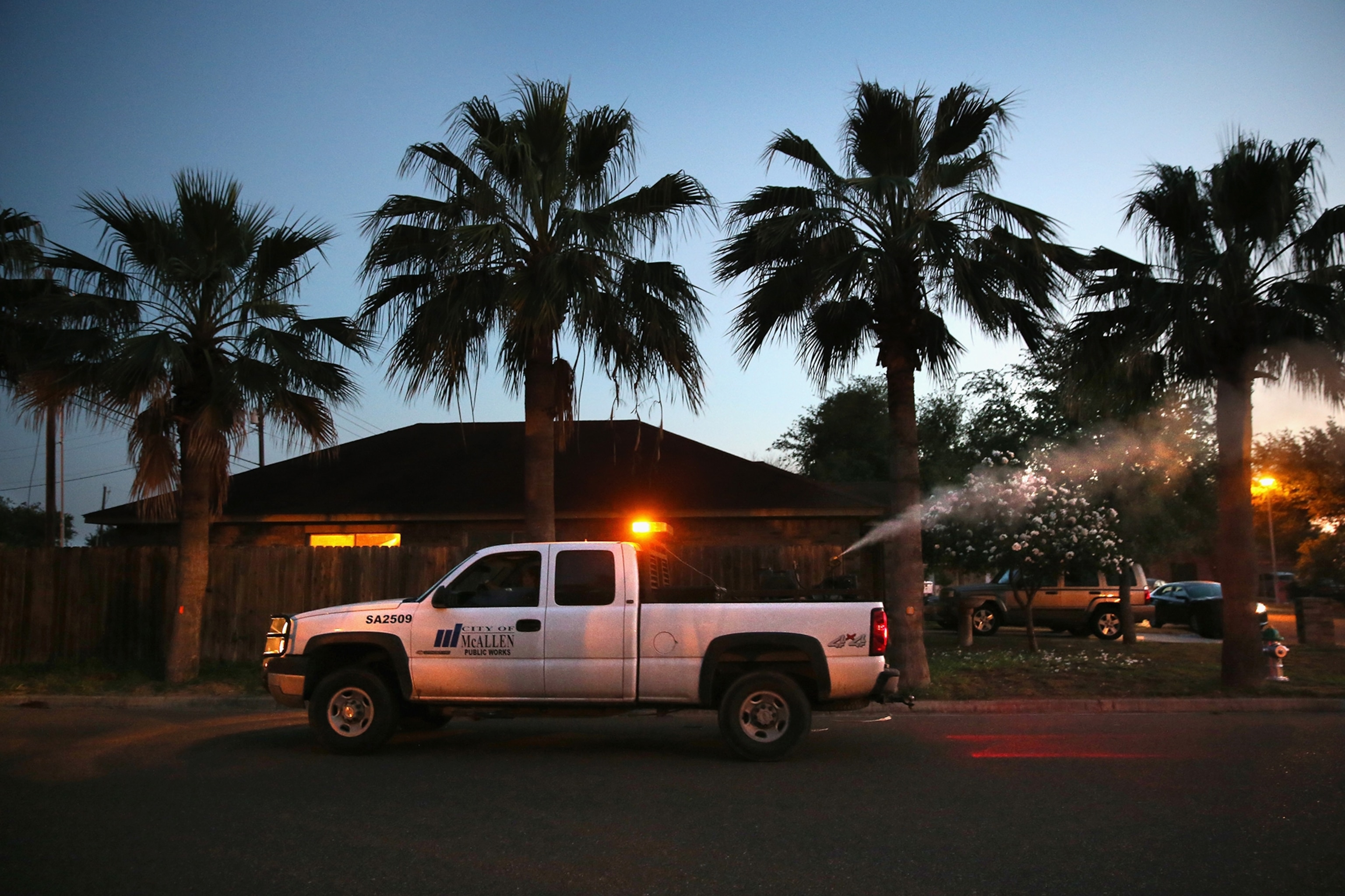MCALLEN, TX - APRIL 14: A health inspector sprays a neighborhood for mosquitos early on April 14, 2016 in McAllen, Texas. Health officials, especially in areas along the Texas-Mexico border, are preparing for the expected arrival of the Zika virus, carried by the aegypti mosquito, which is endemic to the region. The Centers for Disease Control (CDC), announced this week that Zika is the definitive cause of birth defects seen in Brazil and other countries affected by the outbreak. ()