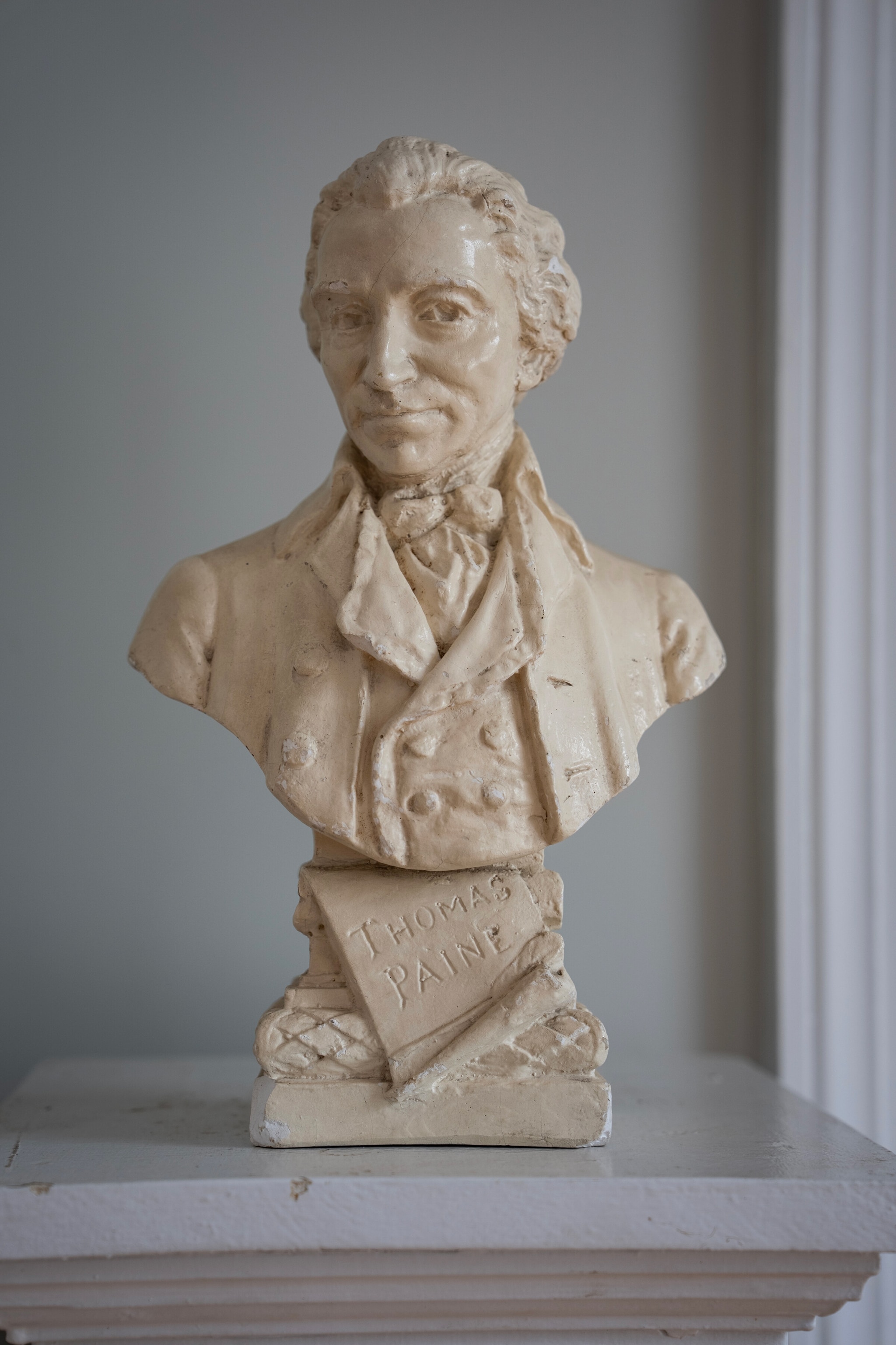 A bust of Thomas Paine.