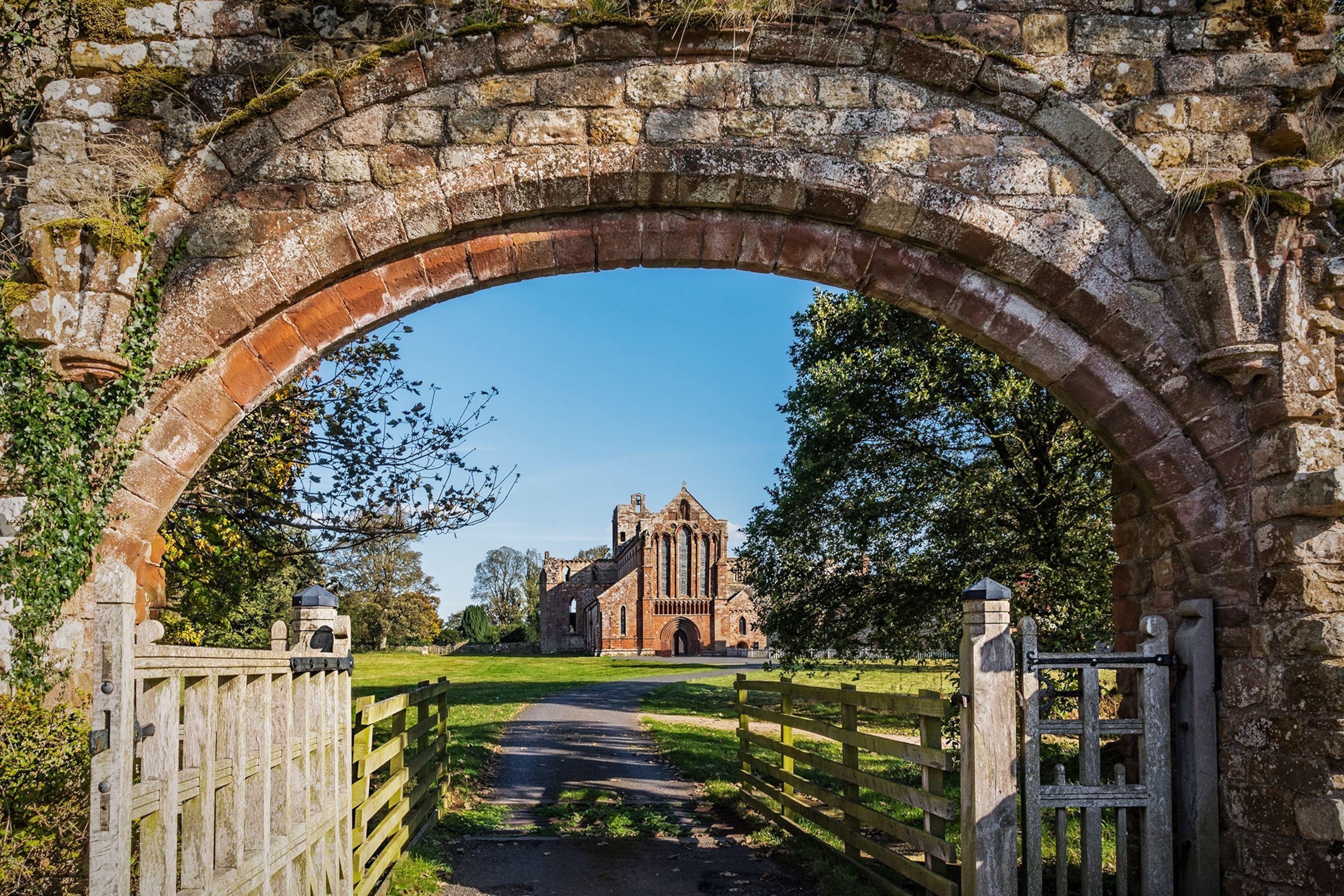 Wide shot of old stone building, Lanercost Priory, England, United Kingdom