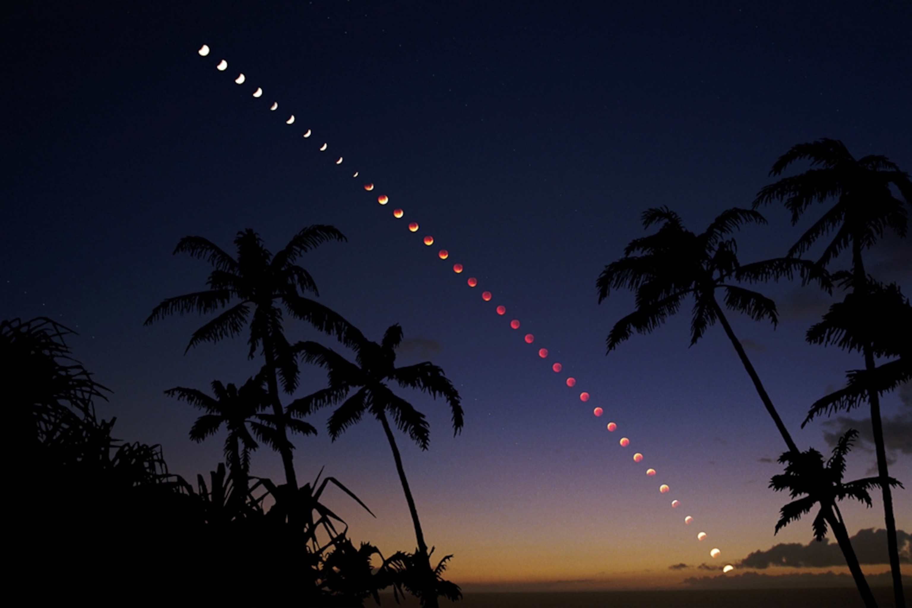 Lunar eclipse picture: an eclipse of the moon setting over Hawaii