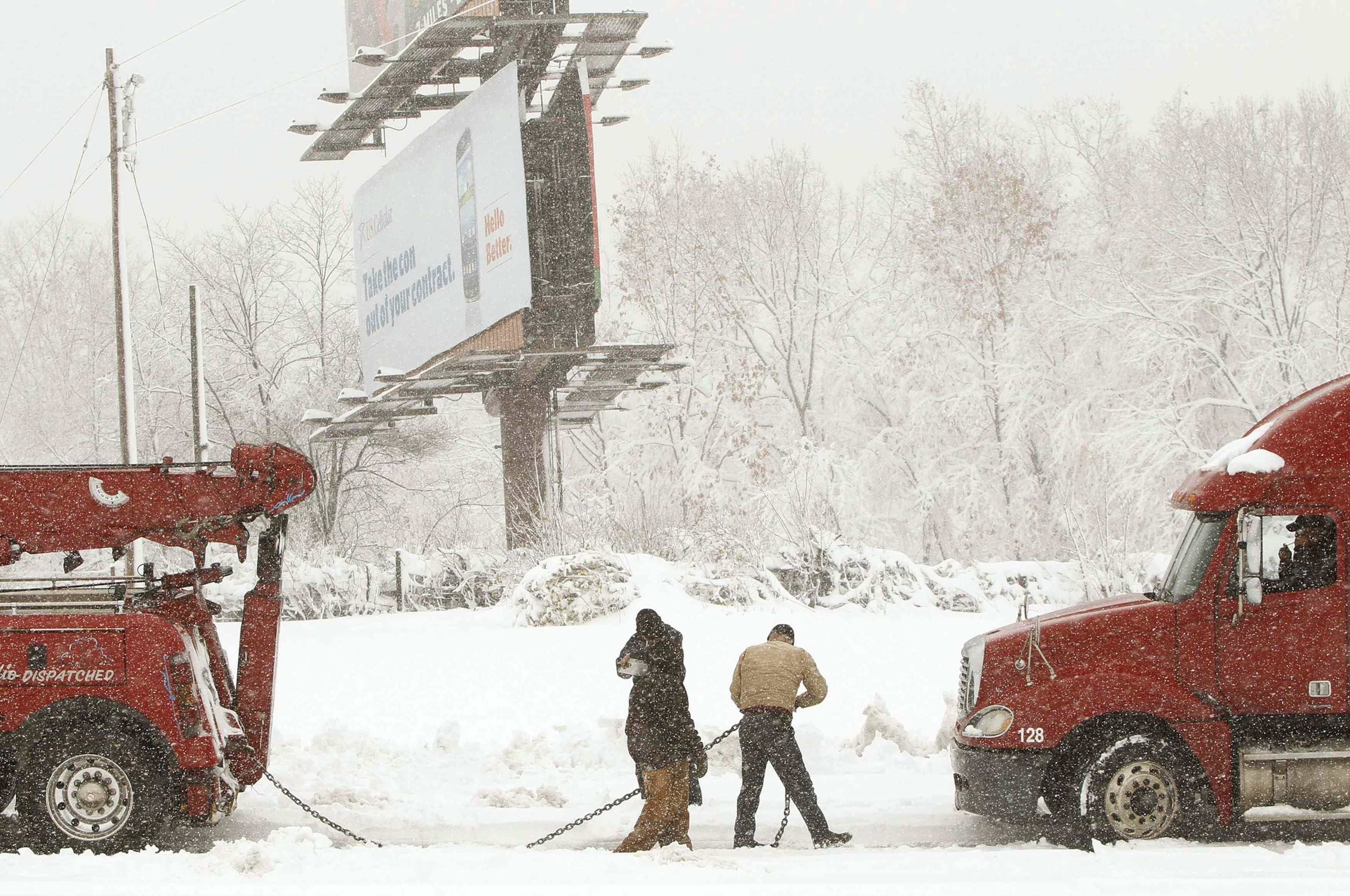 A truck is prepared for towing in western Maryland during snow caused by super storm Sandy.