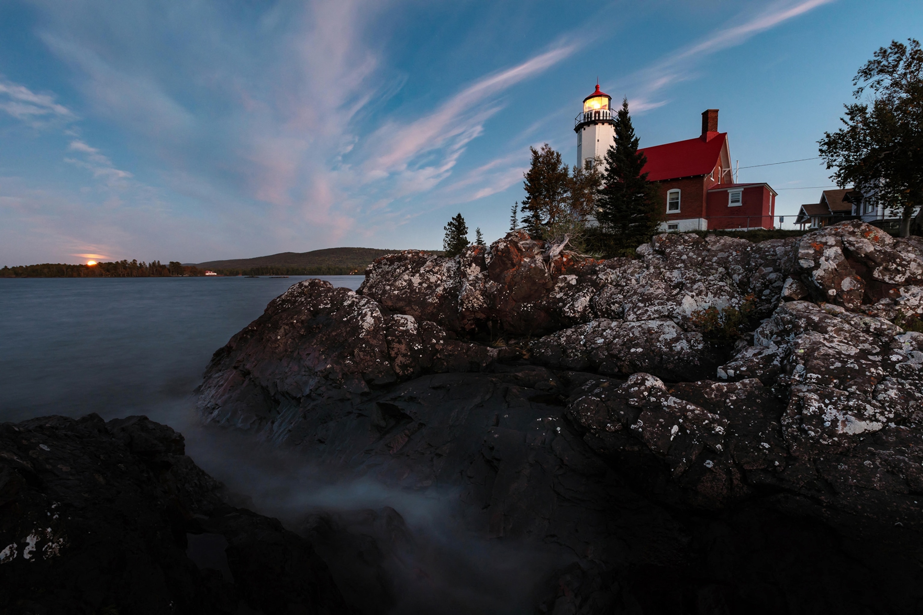 Eagle Harbor Light stands above a rocky entrance to Eagle Harbor in the Keweenaw Peninusla of Michigan.