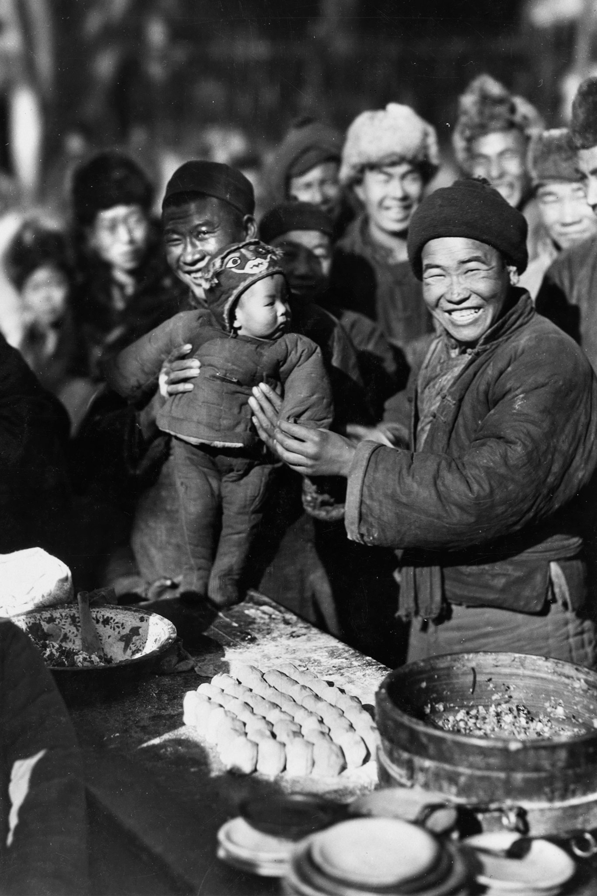 a father and child in a restaurant in China