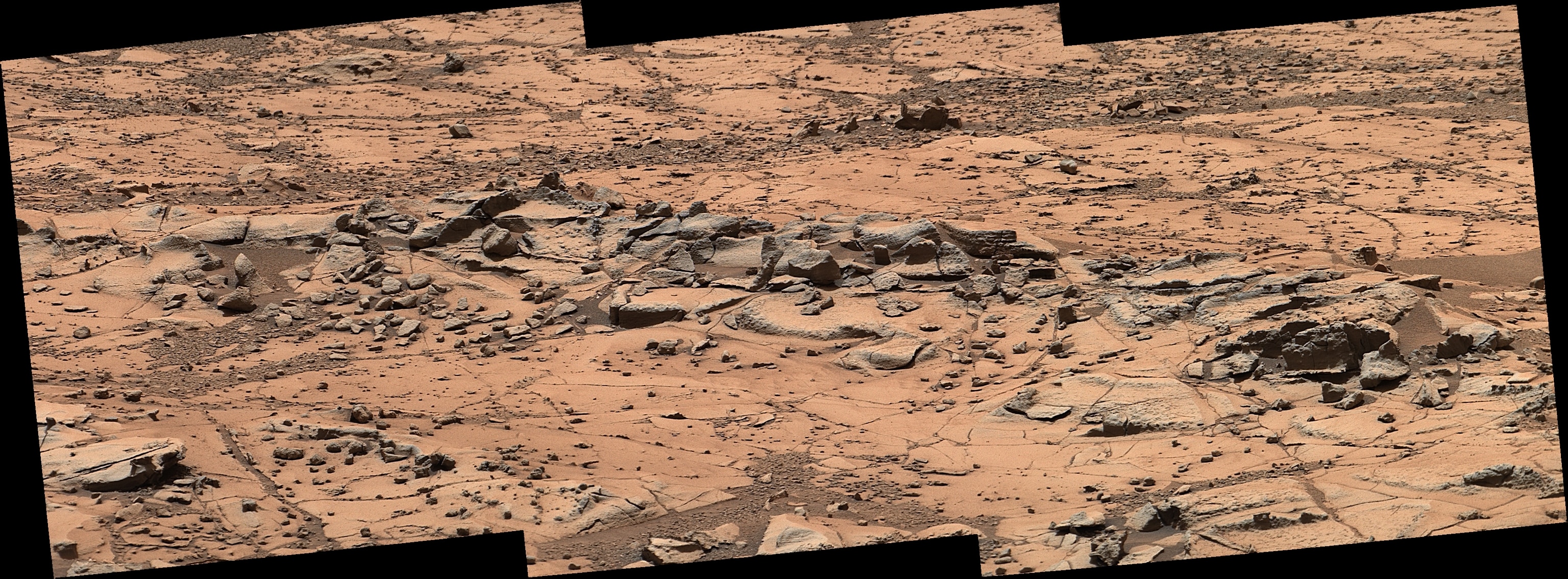 A photograph from the Mars Rover showing a small 3 foot long ridge on Mars.
