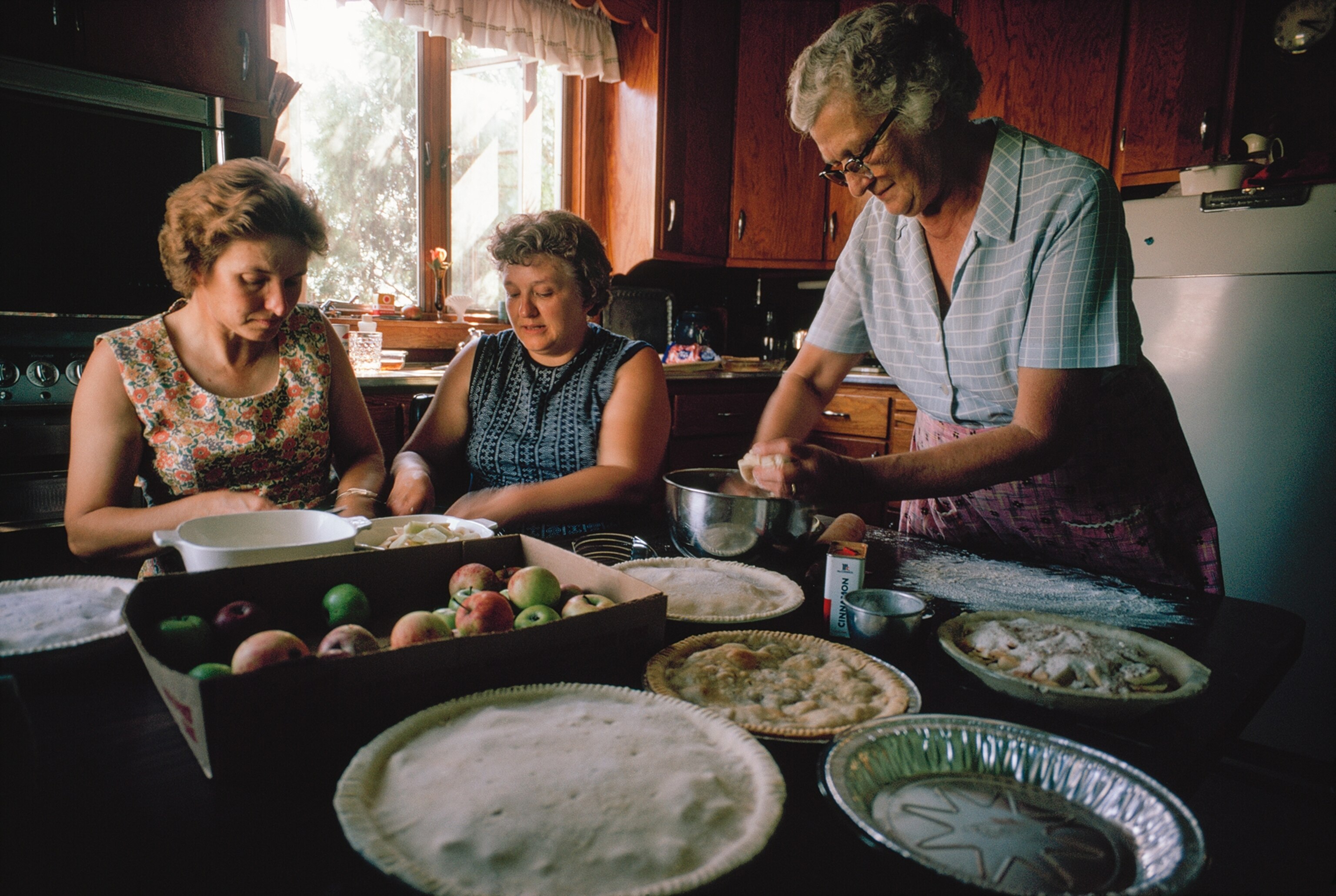 three women making pies