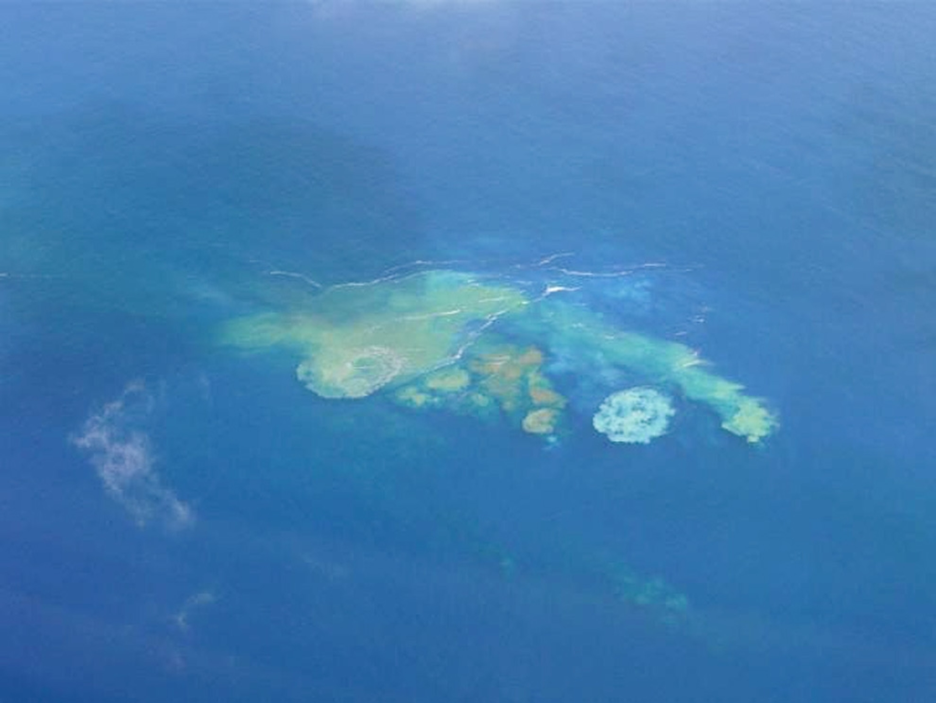 Picture of discolored water from undersea volcano eruption off Japan