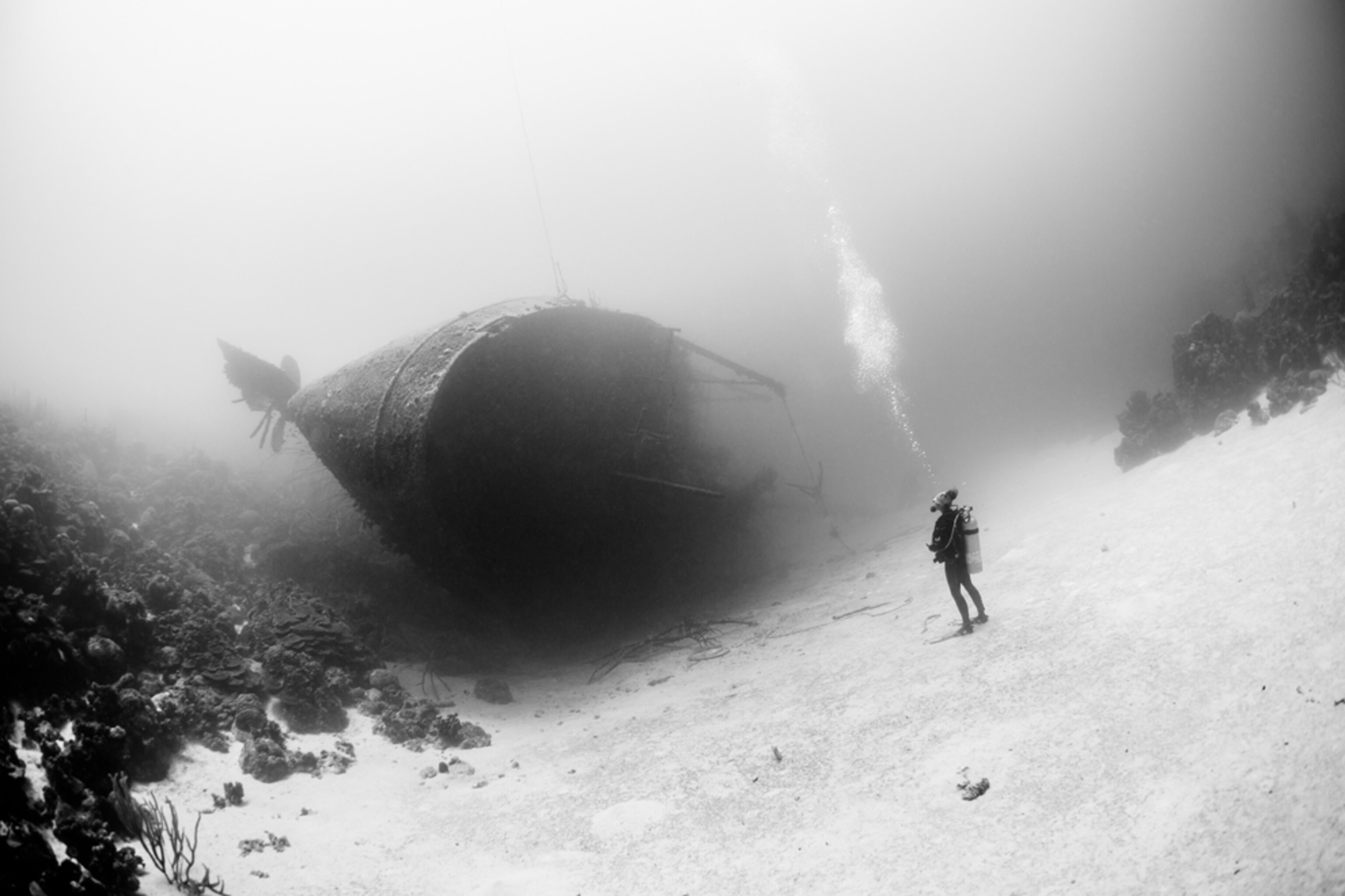 diver at Hilma Hooker wreck Caribbean Sea in Bonaire