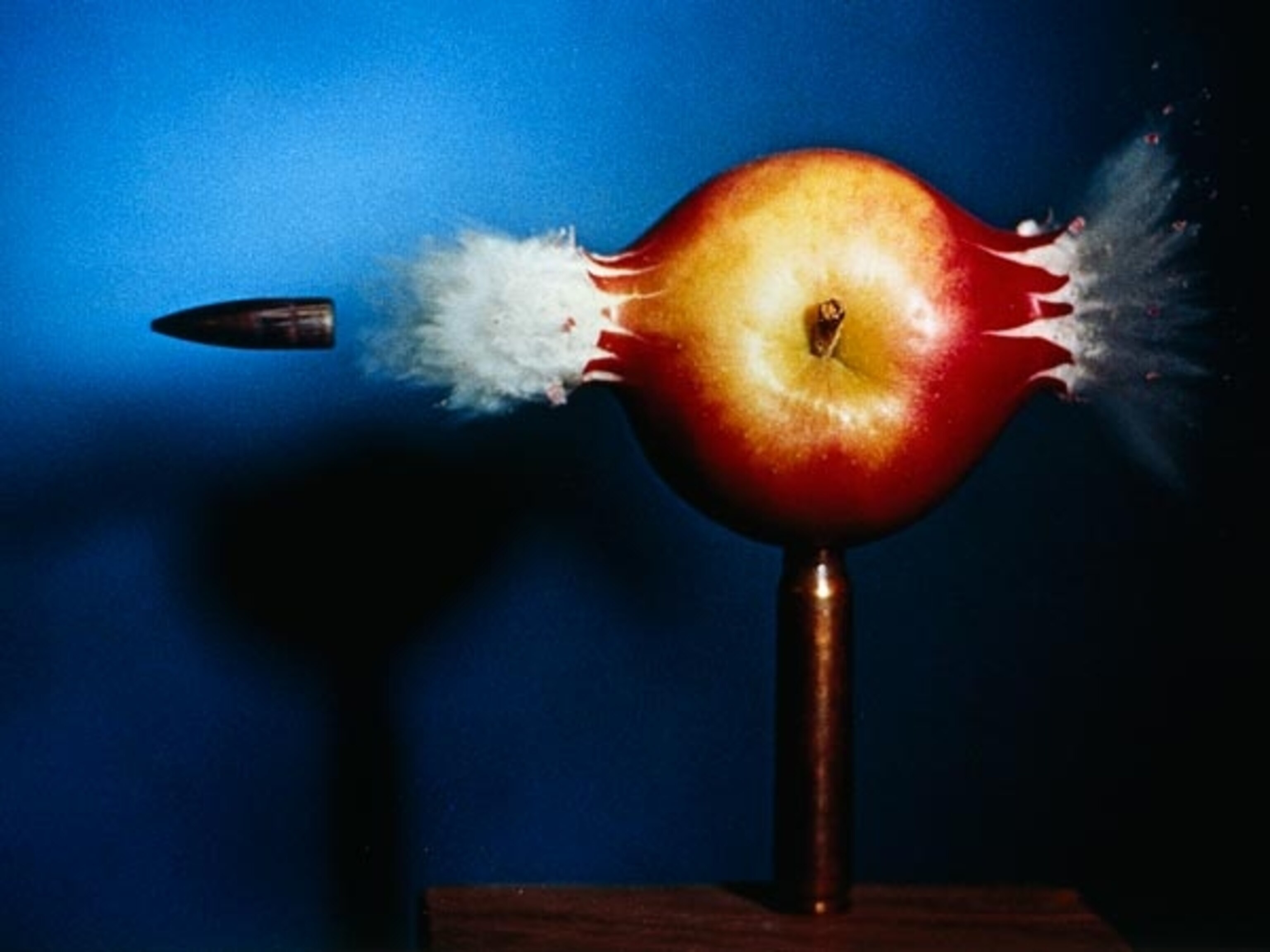 Bullet piercing an apple