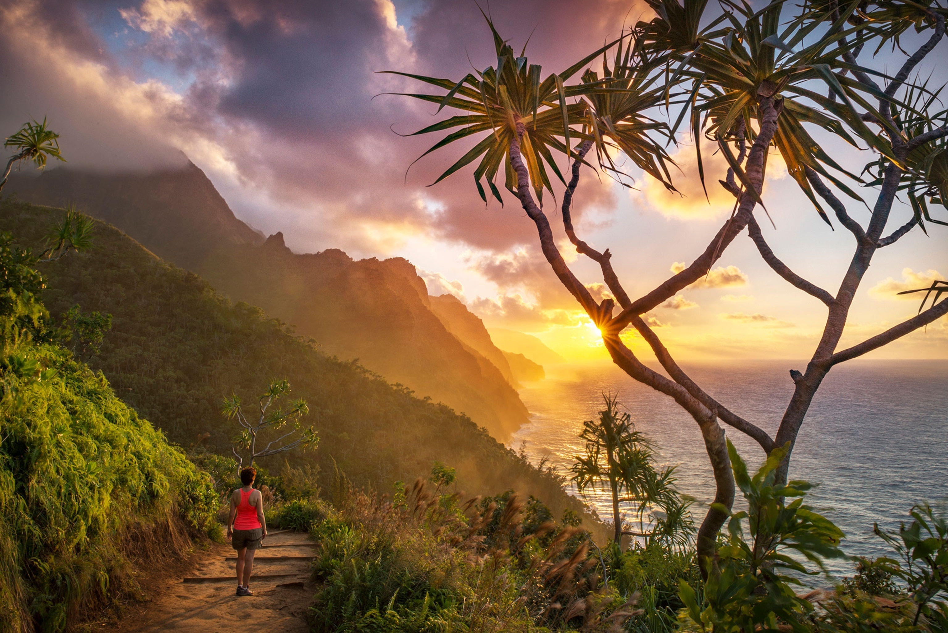 a hiker on the Na Pali Coast, Kauai, Hawaii