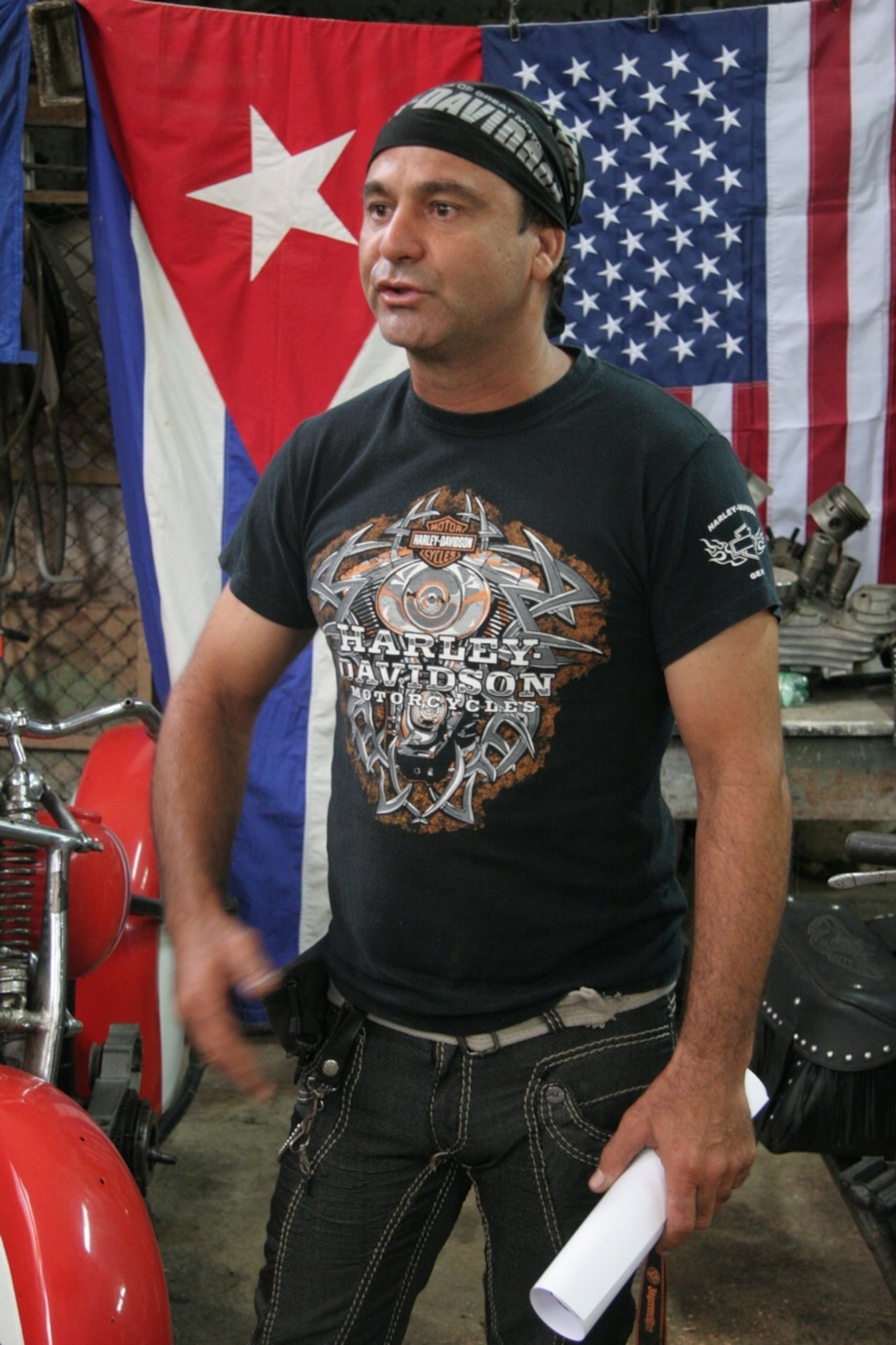 In the garage with Luis. (Photo by Andrew Evans, National Geographic Travel)
